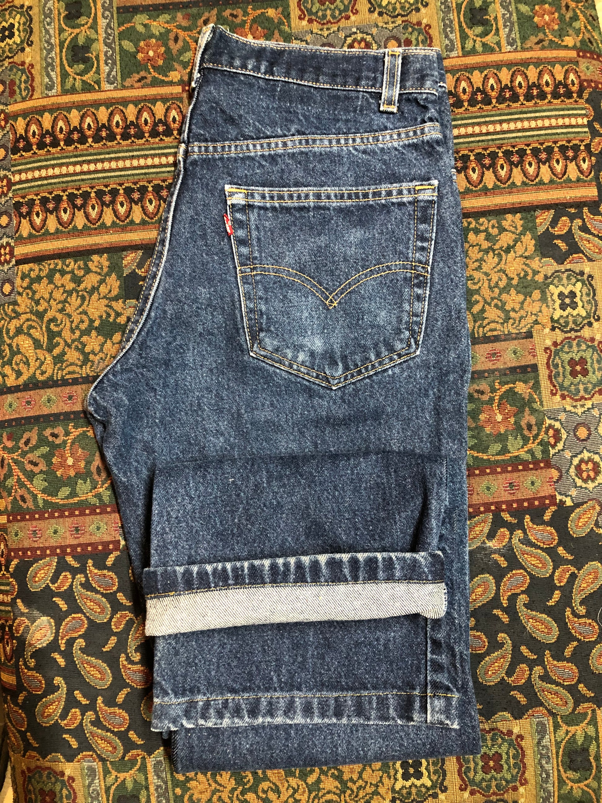 Levi’s 517 Denim Jeans - 33”x26.5”  Vintage Red Tab  High rise  Zip fly  Boot cut leg  100% Cotton  Medium Wash  Button stamp “512”  Tagged at 33x34 Professionally hemmed at 26,5”  Made in USA - Kingspier Vintage