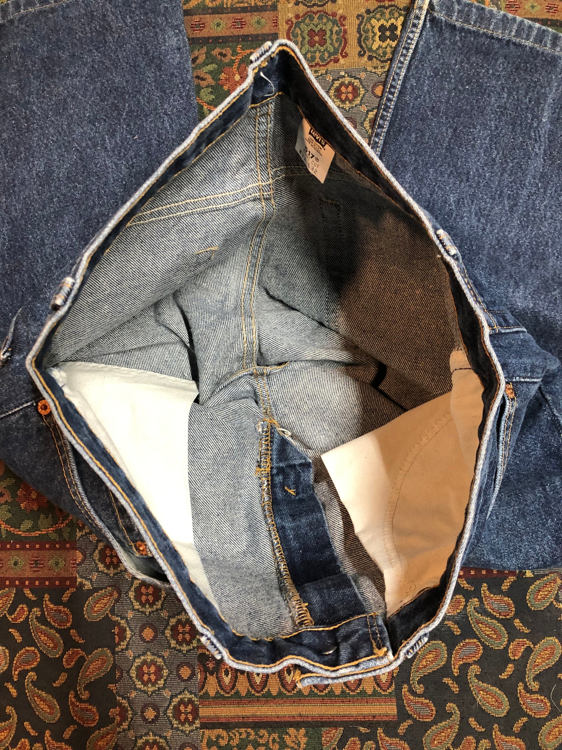 Levi’s 517 Denim Jeans - 33”x26.5”  Vintage Red Tab  High rise  Zip fly  Boot cut leg  100% Cotton  Medium Wash  Button stamp “512”  Tagged at 33x34 Professionally hemmed at 26,5”  Made in USA - Kingspier Vintage