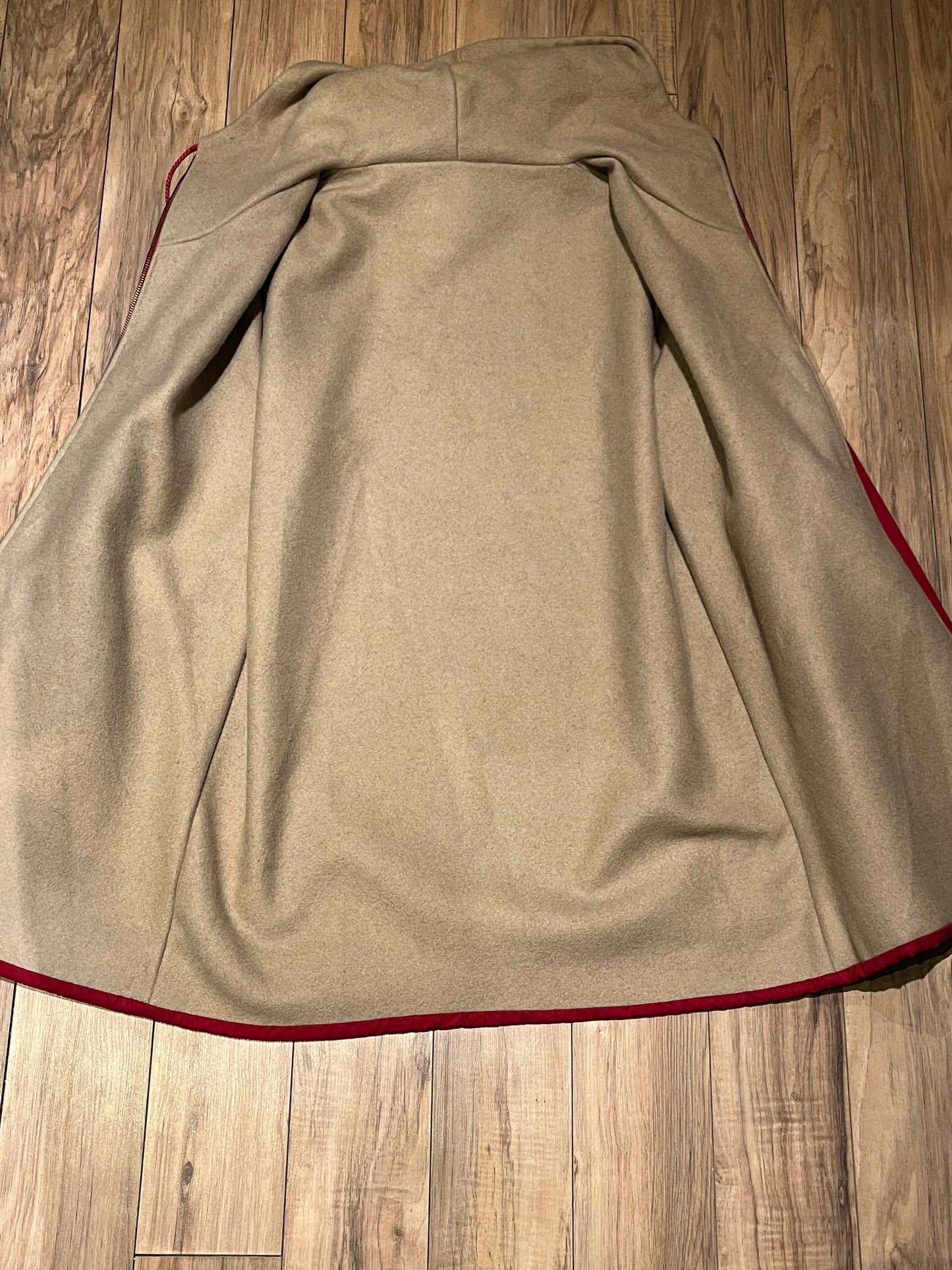 Vintage red northern parka with cotton shell, wool lining, zipper closure and two front pockets.
Chest 44”