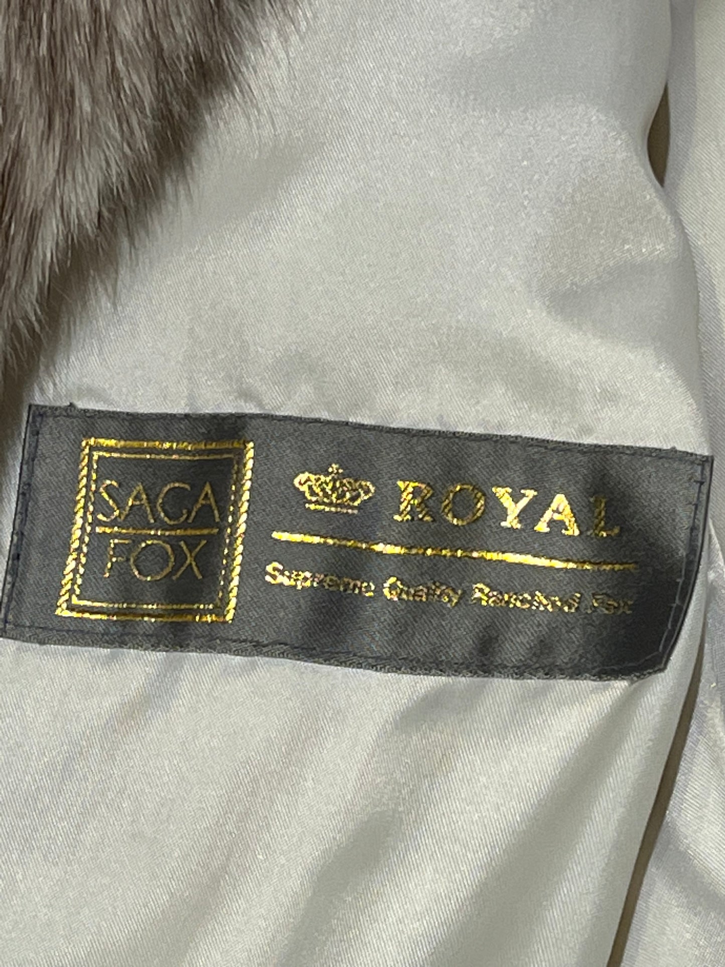 Vintage Saga Fox Royal Genuine Blue Fox Fur Coat with hook and eye closures and two front pockets.
Size 10