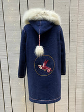 Load image into Gallery viewer, Vintage blue wool northern parka with zipper closures, two patch pockets, white fur trimmed hood, hand embroidered flower details and an embroidered bird on the back. 

Chest 42”

