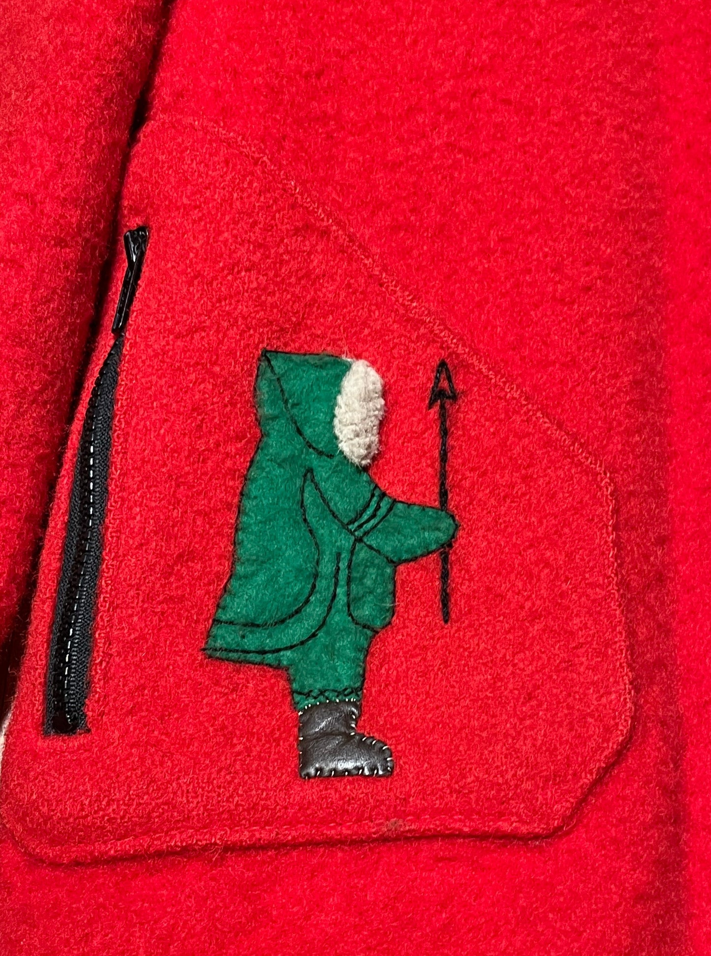 Vintage James Bay 100% pure virgin wool red northern parka with white fur trimmed hood, zipper and snap closures, two zip front pockets, drawstring at the waist, leather trimmed cuffs, a quilted lining and felt applique details.
Made in Canada
Chest 40”