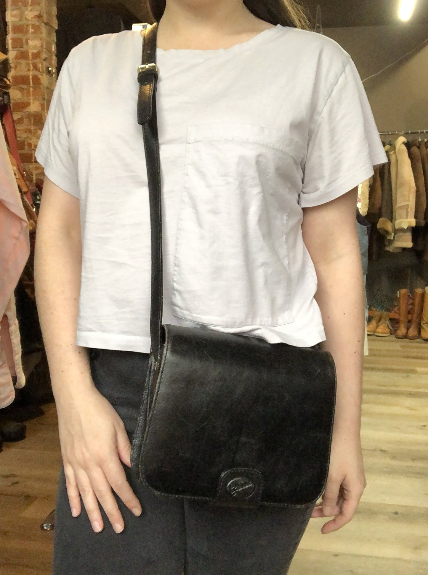 Kingspier Vintage - Stephane black leather crossbody bag with adjustable strap five compartments, two with zippers magnetic snap front closure.
Length - 7.5”
Width - .2.5”
Height - 5.5”
Strap - 47” - 45.5”
This purse is in excellent condition.