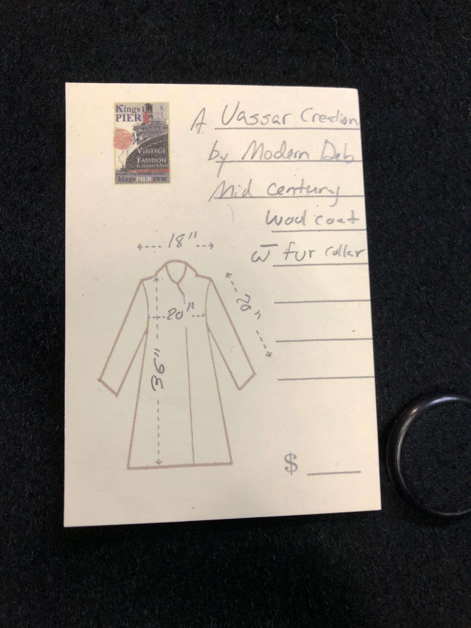 Kingspier Vintage - Vintage mid century Vassar Creation by Modern Deb long black wool coat with brown fur collar, button closures, two front pockets and a satin lining.
Size medium.