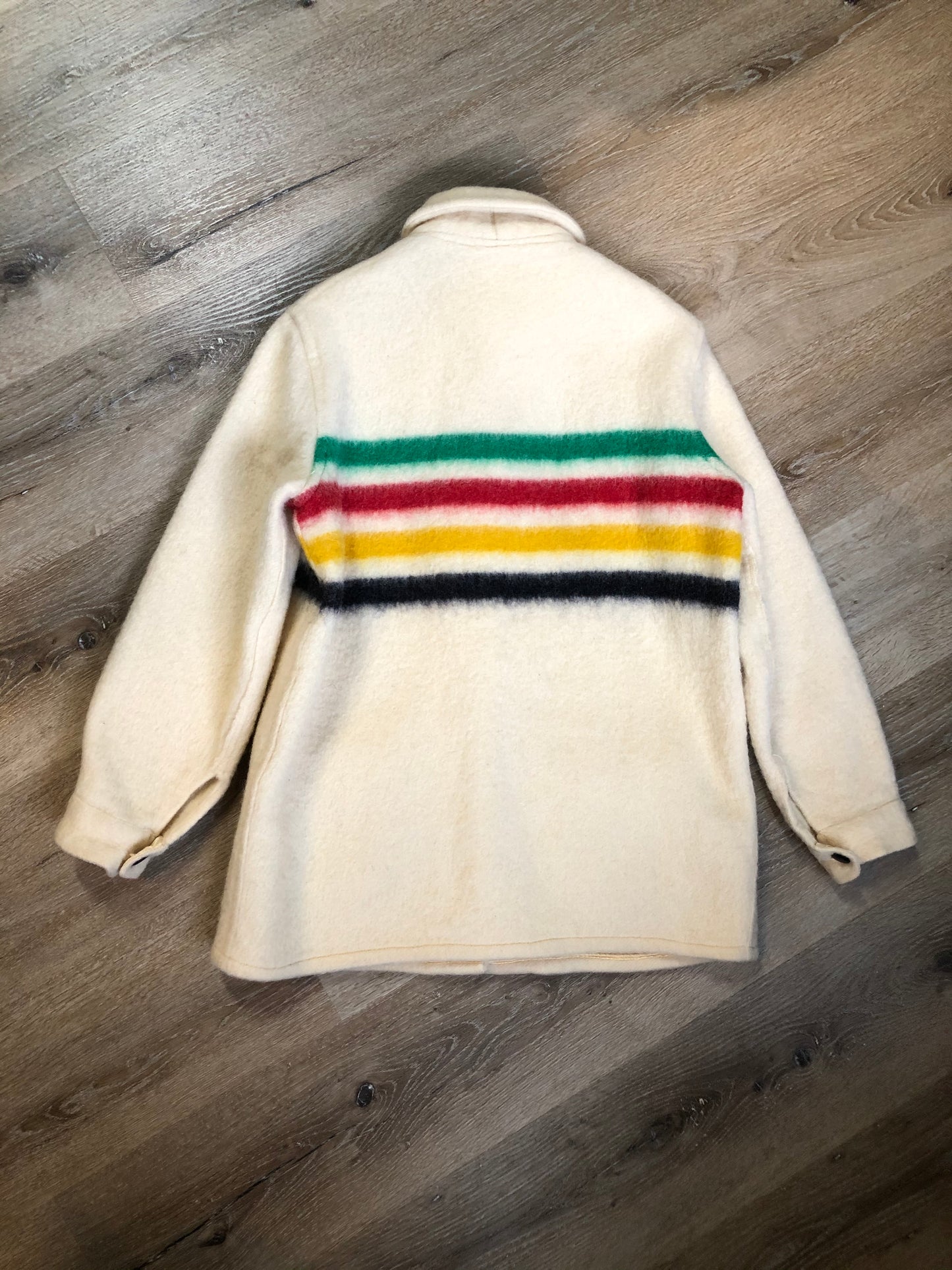 Kingspier Vintage - Vintage Hudson’s Bay Company point blanket jacket in iconic multi-stripe colours with flap pockets and button closures. Mens size small.