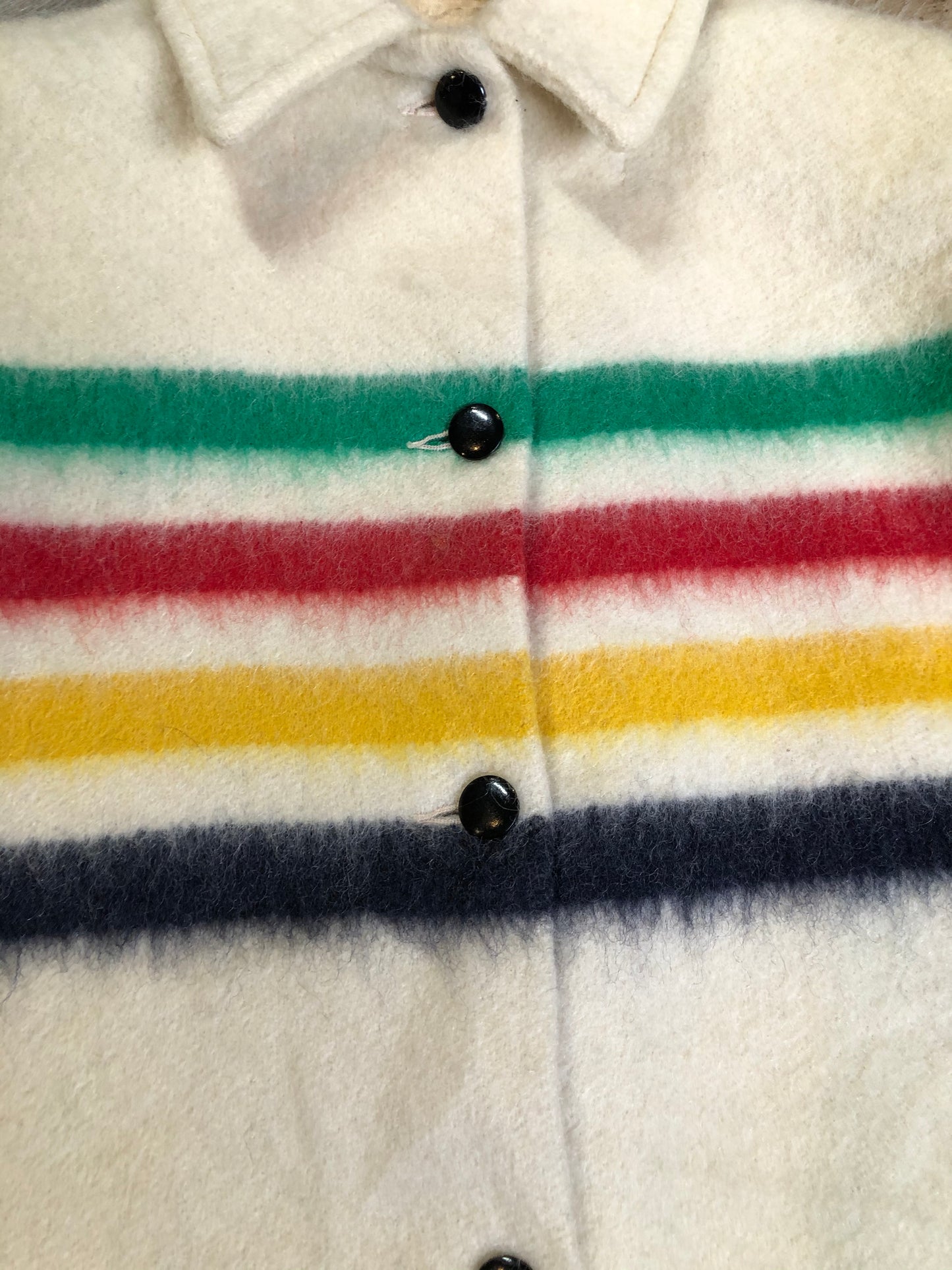 Kingspier Vintage - Vintage Hudson’s Bay Company point blanket jacket in iconic multi-stripe colours with flap pockets and button closures. Mens size small.