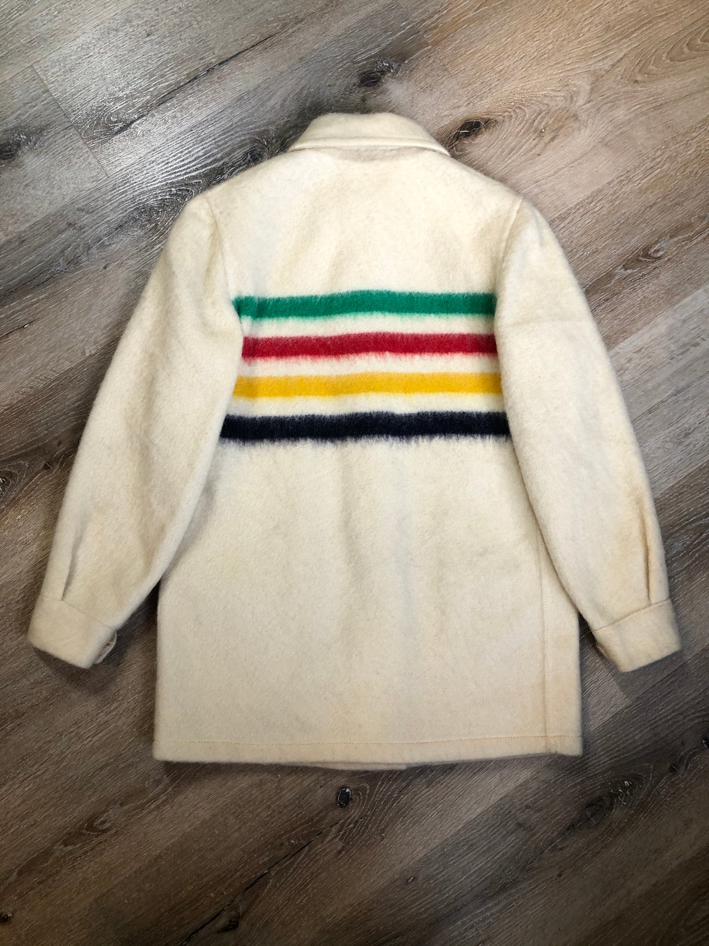 Kingspier Vintage - Vintage Hudson’s Bay Company point blanket jacket in iconic multi-stripe colours with flap pockets and button closures. Mens size small.