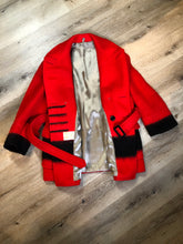 Load image into Gallery viewer, Kingspier Vintage - Genuine Hudson’s Bay Company point blanket coat in red with thick black stripe. The coat features flap pockets and hand warmer pockets, double breasted button closures and belt. Made in Canada. Mens size 48.

