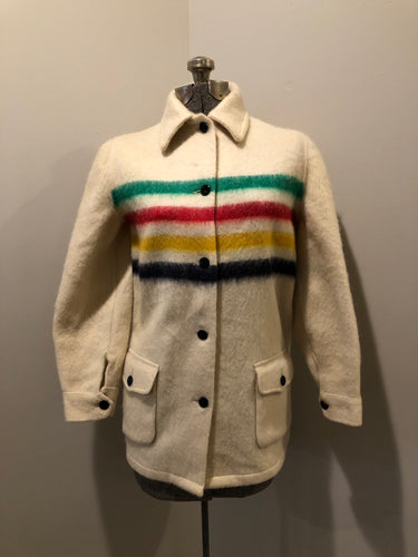 Kingspier Vintage - Vintage Hudson’s Bay Company point blanket jacket in iconic multi-stripe colours with flap pockets and button closures. Mens size small.
