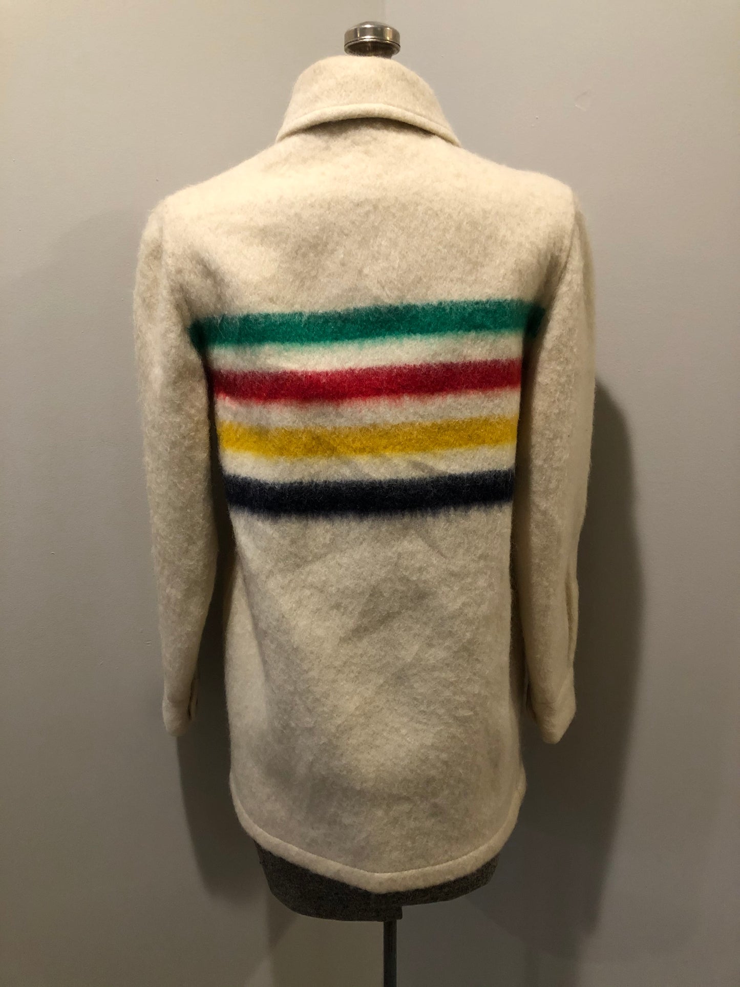 Kingspier Vintage - Vintage Hudson’s Bay Company point blanket jacket in iconic multi-stripe colours with flap pockets and button closures. Mens size small.