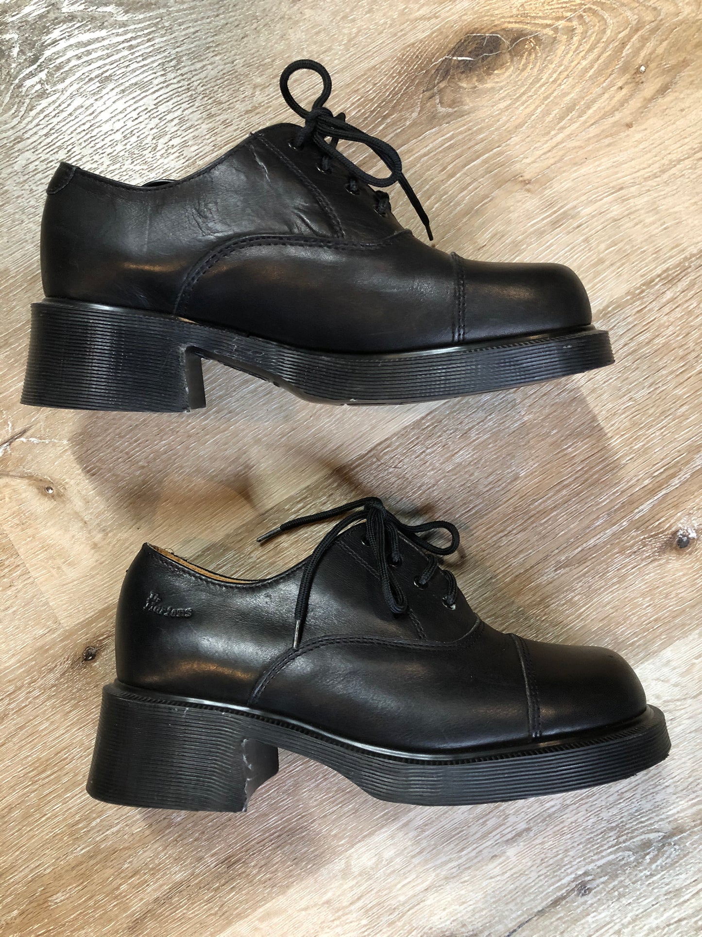 Kingspier Vintage - Brand new, made in UK! Black Doc Martens, heeled 70s style (more dramatic than the modern "Shriver" style.) Top of shoe hits at the ankle.
Size UK 6/ US W 8.5
