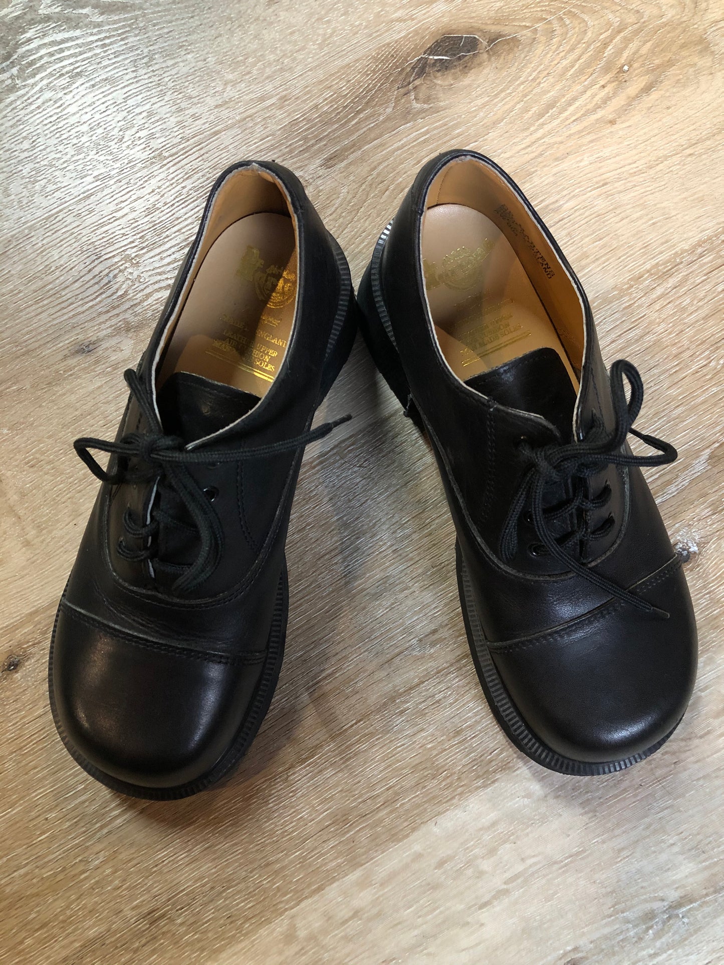 Kingspier Vintage - Brand new, made in UK! Black Doc Martens, heeled 70s style (more dramatic than the modern "Shriver" style.) Top of shoe hits at the ankle.
Size UK 6/ US W 8.5