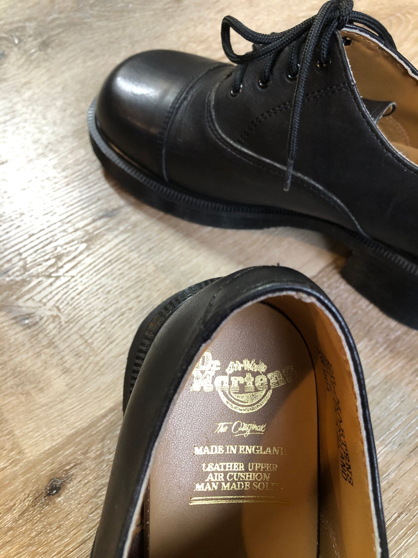 Kingspier Vintage - Brand new, made in UK! Black Doc Martens, heeled 70s style (more dramatic than the modern "Shriver" style.) Top of shoe hits at the ankle.
Size UK 6/ US W 8.5