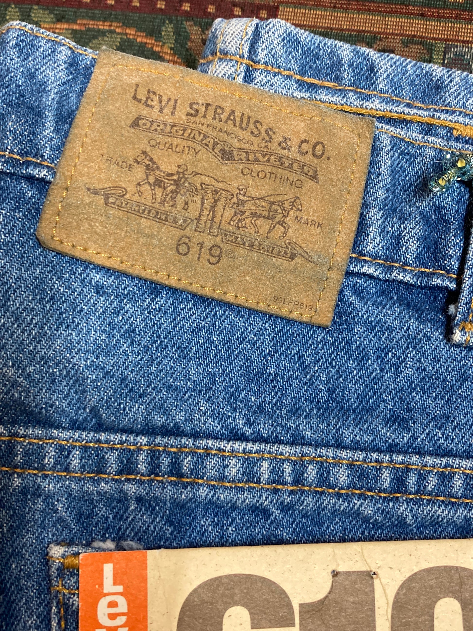 Levi’s 619 Denim Jeans, new with tags  Vintage Deadstock  Orange Tab  High Waist  Straight leg  Labeled 38”x32”  Button stamped “C63”  Made in Canada - Kingspier Vintage