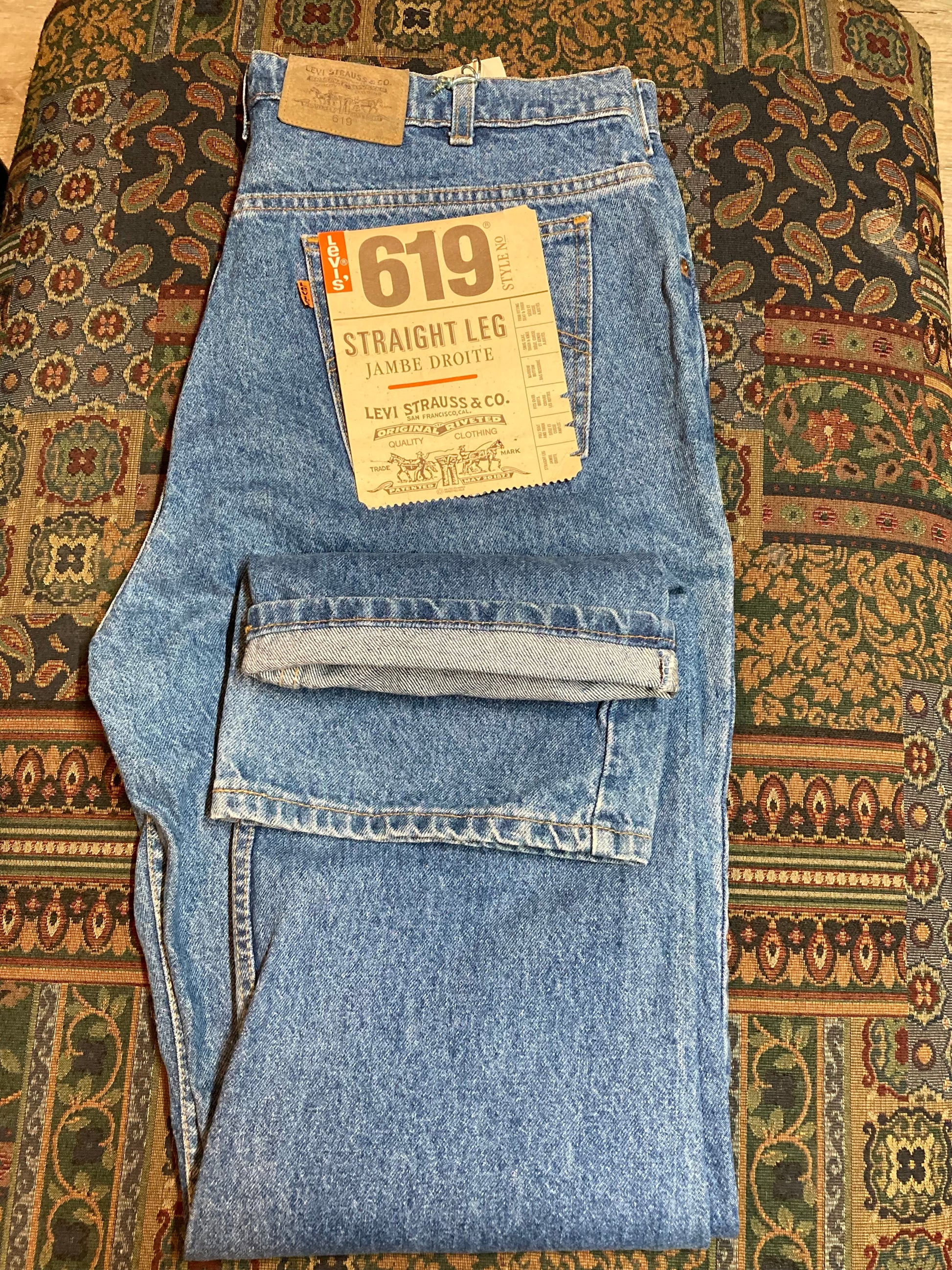 Levi’s 619 Denim Jeans, new with tags  Vintage Deadstock  Orange Tab  High Waist  Straight leg  Labeled 38”x32”  Button stamped “C63”  Made in Canada - Kingspier Vintage