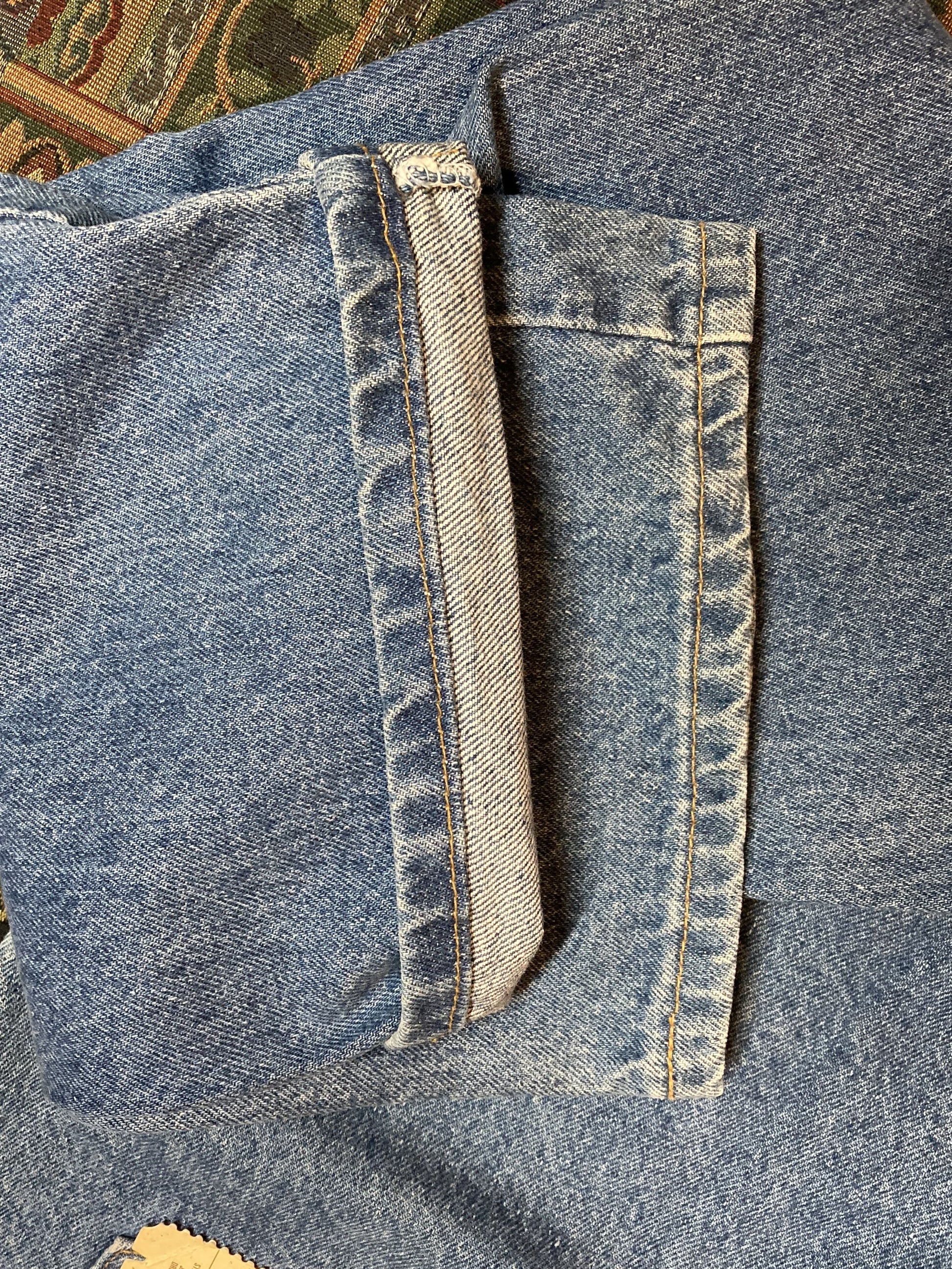 Levi’s 619 Denim Jeans, new with tags  Vintage Deadstock  Orange Tab  High Waist  Straight leg  Labeled 38”x32”  Button stamped “C63”  Made in Canada - Kingspier Vintage