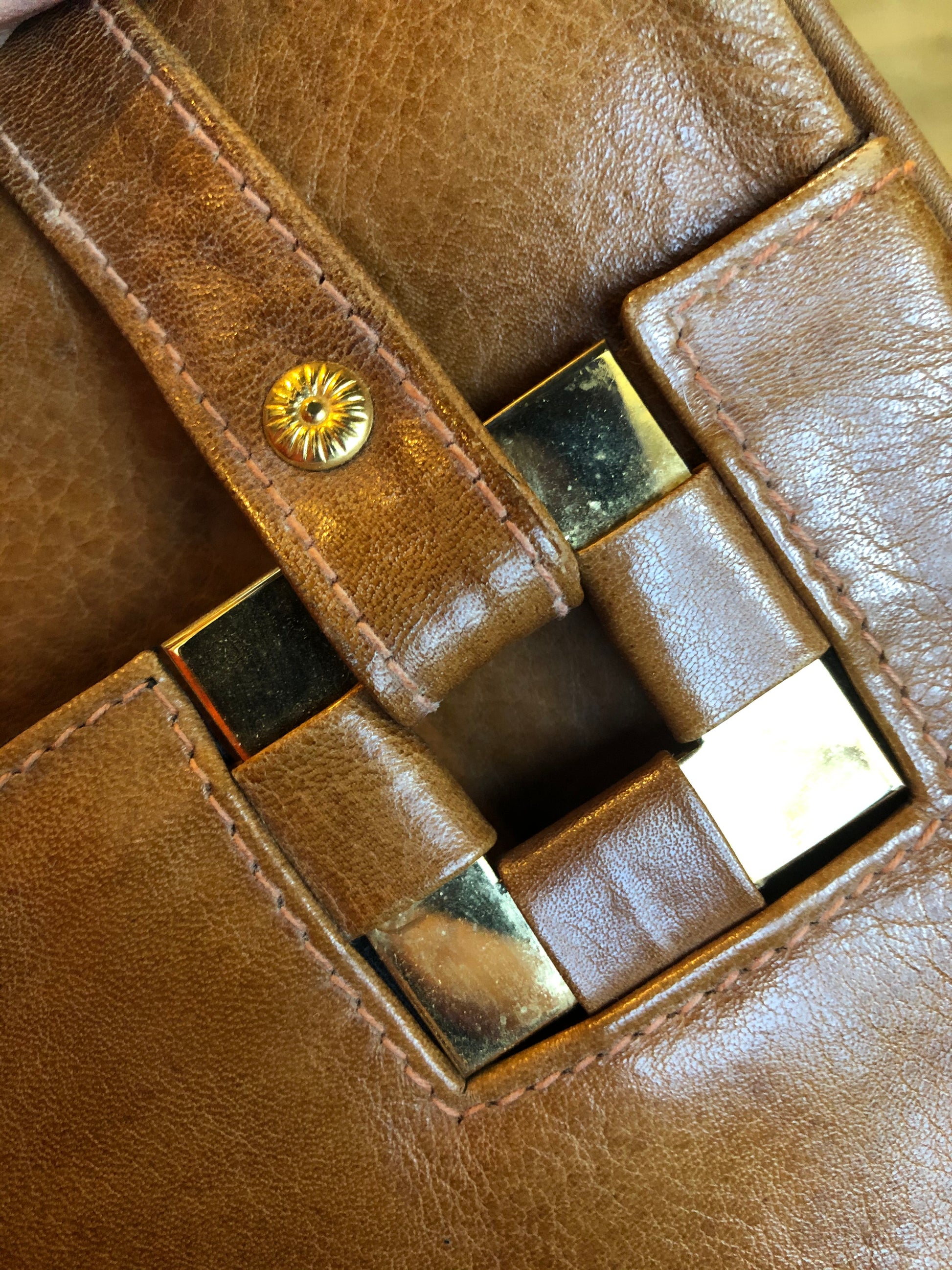 Kingspier Vintage - Jordan Marsh tan leather handbag with gold hardware and three inside compartments.