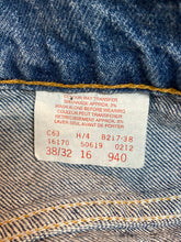 Load image into Gallery viewer, Levi’s 619 Denim Jeans, new with tags  Vintage Deadstock  Orange Tab  High Waist  Straight leg  Labeled 38”x32”  Button stamped “C63”  Made in Canada - Kingspier Vintage

