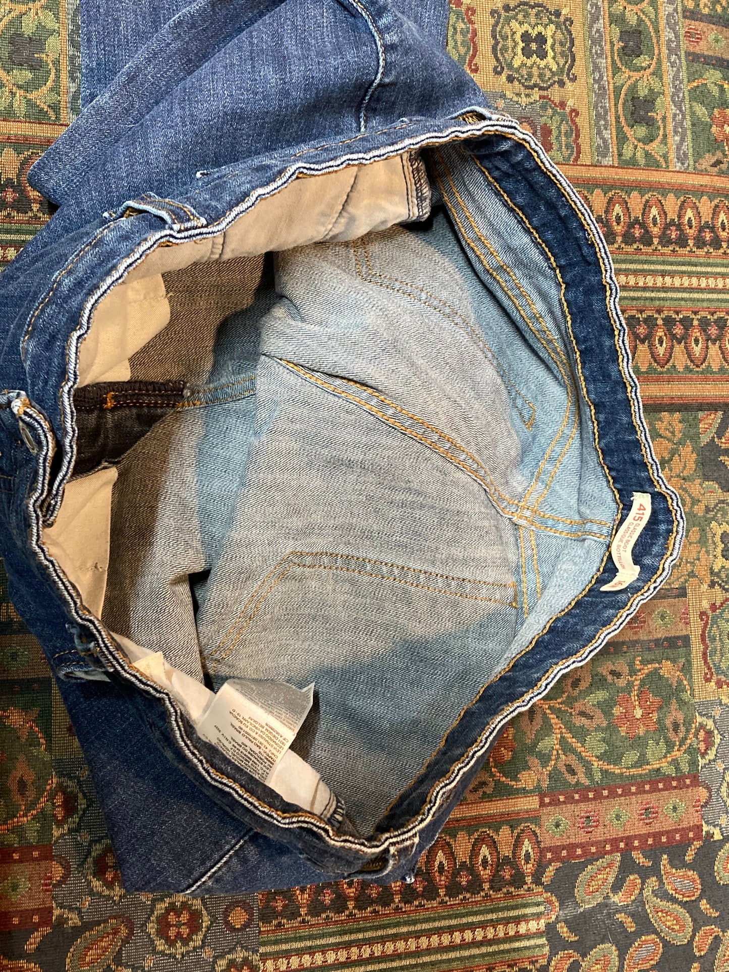Levi’s 415 - Classic Boot Cut - 37”x30.5”, Size 16 Sits below waist Classic boot cut leg 99^ cotton/ 1% elastane Medium wash Made in Pakistan - Kingspier Vintage