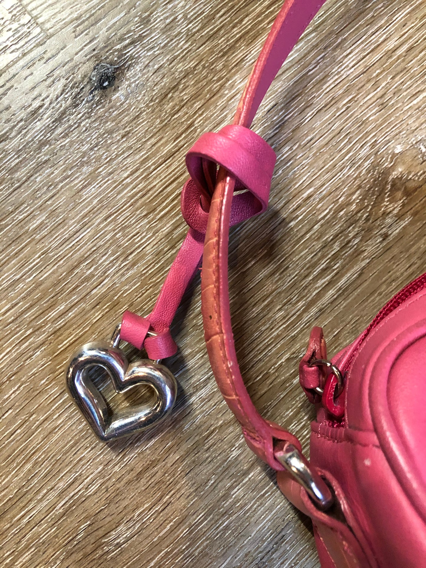 Kingspier Vintage - Brighton bubble gum pink leather handbag with leather croc-embossed details, heart motifs and colourful stripe lining.