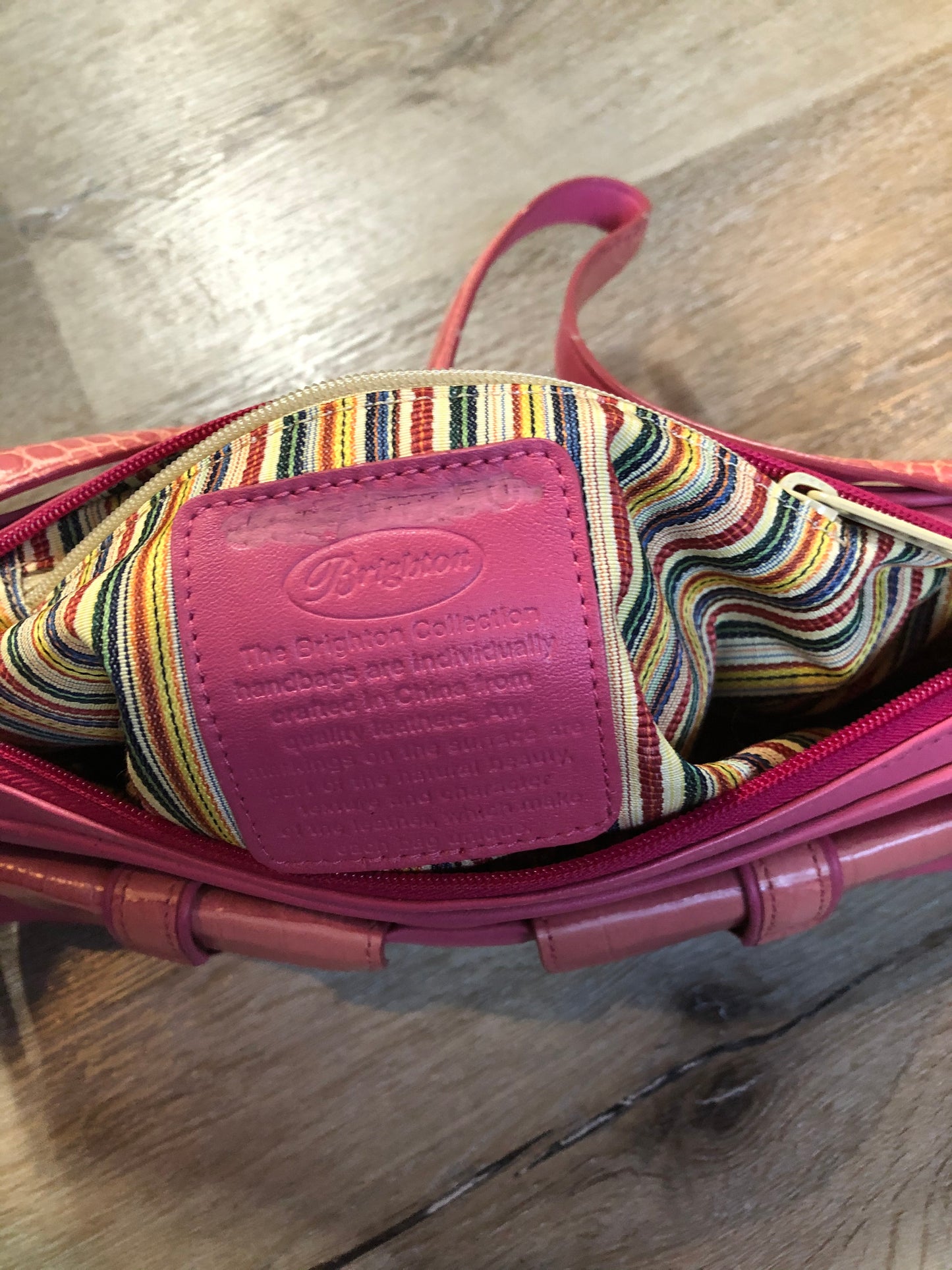 Kingspier Vintage - Brighton bubble gum pink leather handbag with leather croc-embossed details, heart motifs and colourful stripe lining.