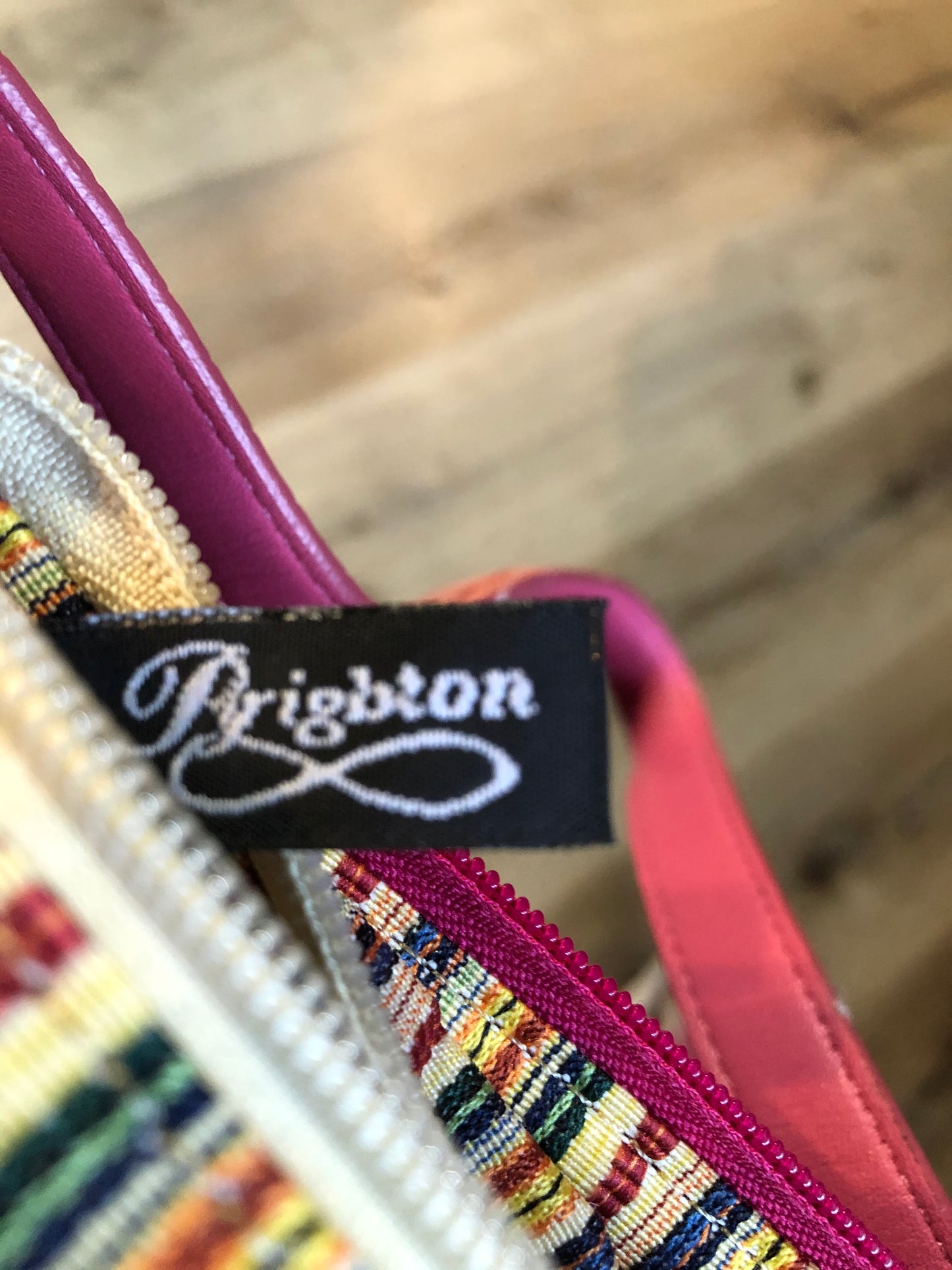 Kingspier Vintage - Brighton bubble gum pink leather handbag with leather croc-embossed details, heart motifs and colourful stripe lining.