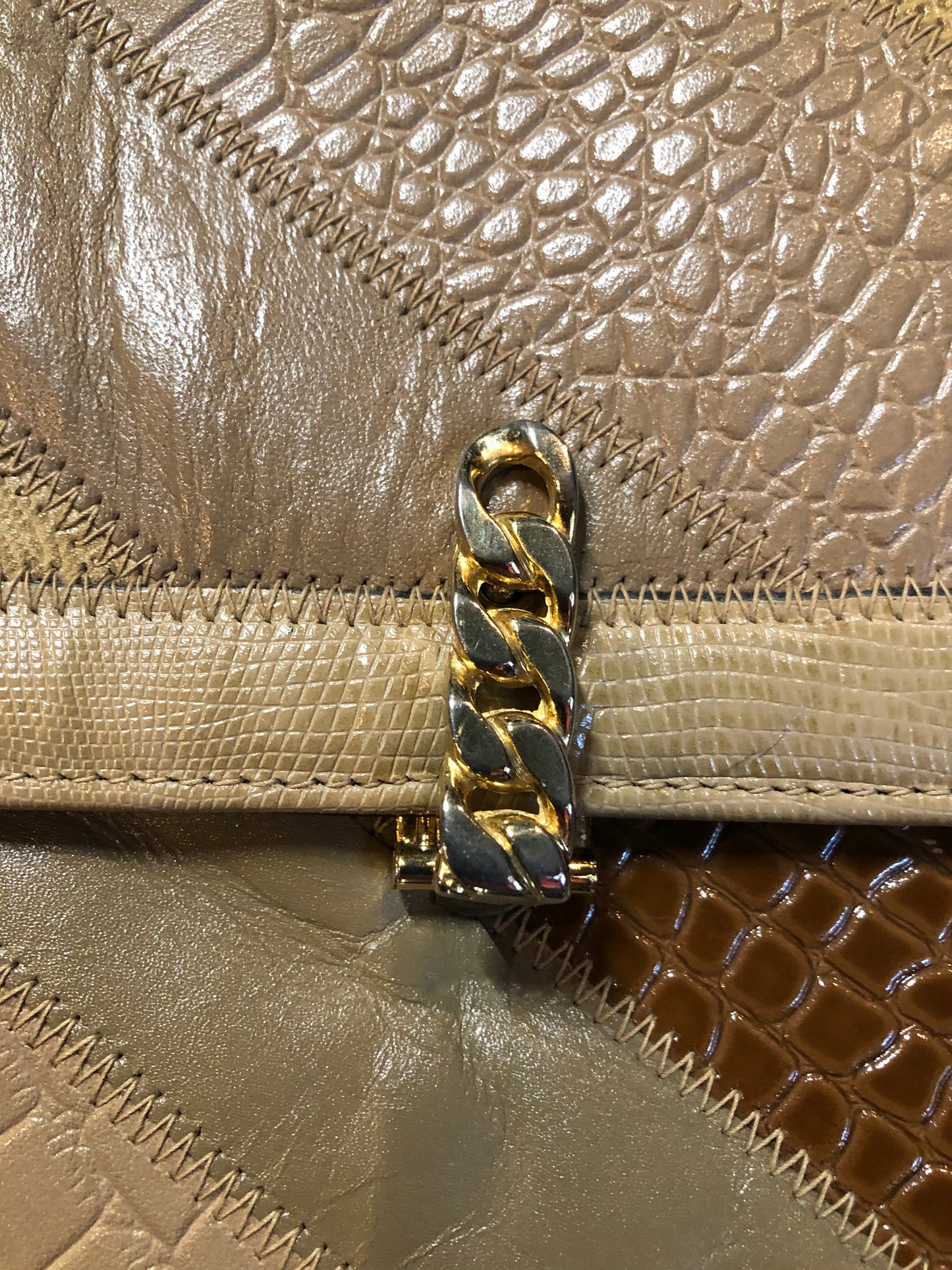 Kingspier Vintage - Caprice leather and snakeskin patchwork envelope clutch with chain shoulder strap and unique front clasp. Made in the USA.