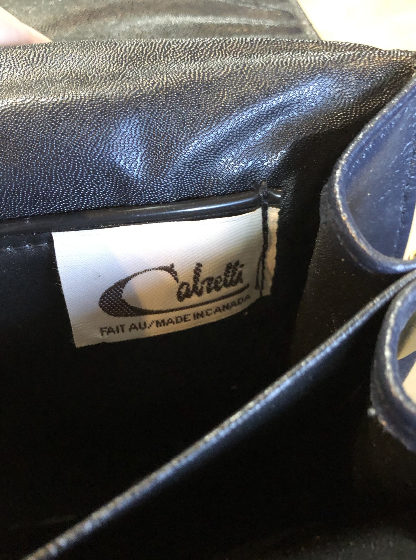 Kingspier Vintage - Carelli navy crossbody bag with snap closure, chain strap and two compartments inside. Made in Canada.