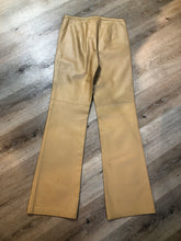 Load image into Gallery viewer, Kingspier Vintage - Cami International beige bootcut leather pants with poly blend lining. Size women’s 6T.

waist -31”
Outseam - 44”
Inseam - 35”
Rise - 9”

Pants are in excellent condition with some minor wear.
