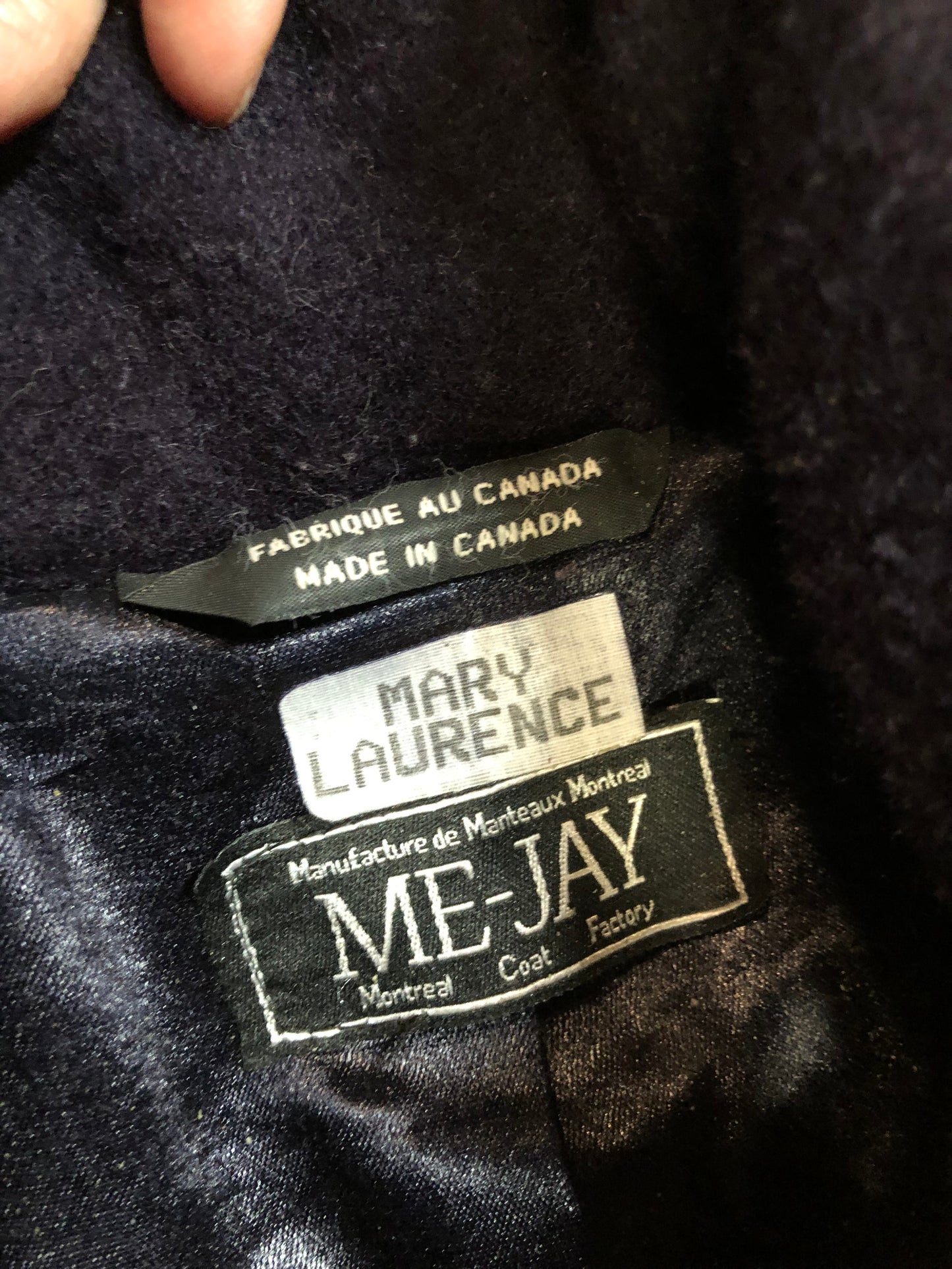 Kingspier Vintage - Vintage Me-Jay deep purple wool blend coat with large button closures, two front pockets and detail at the wrist. Shell is 65% wool/ 10% mohair and 5% alpaca.
Made in Canada.
Size 8.