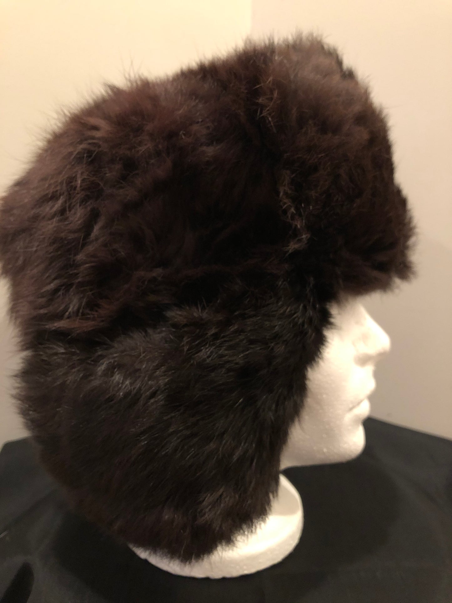Kingspier Vintage - Vintage Russian ushanka dark brown fur hat. The tag reads XXL but it fits small.
This hat is in excellent condition.