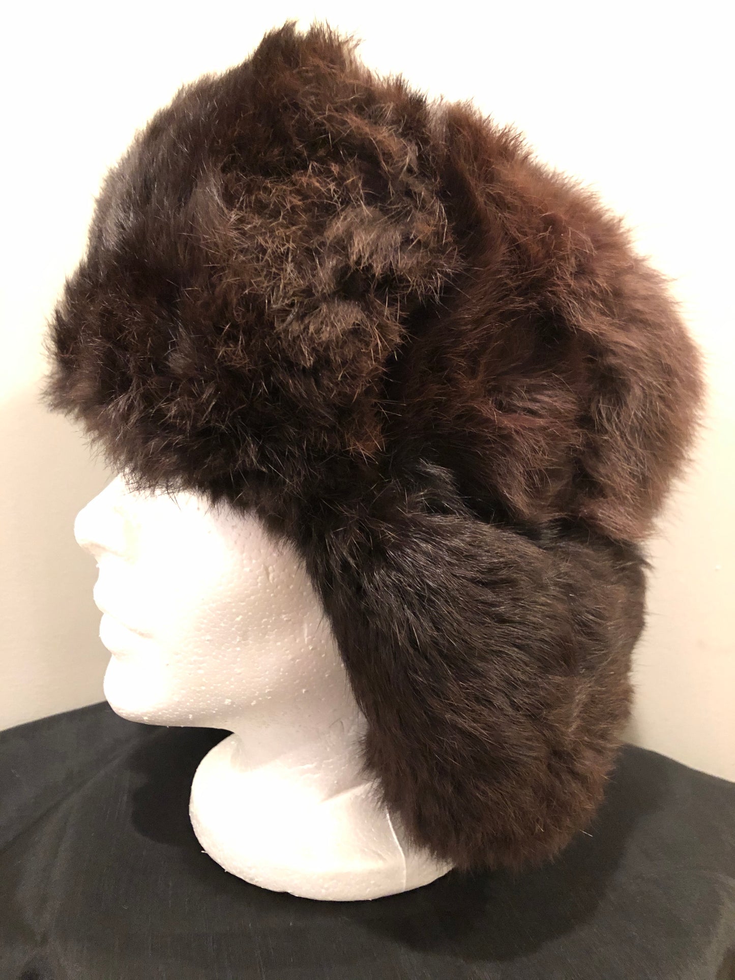 Kingspier Vintage - Vintage Russian ushanka dark brown fur hat. The tag reads XXL but it fits small.
This hat is in excellent condition.
