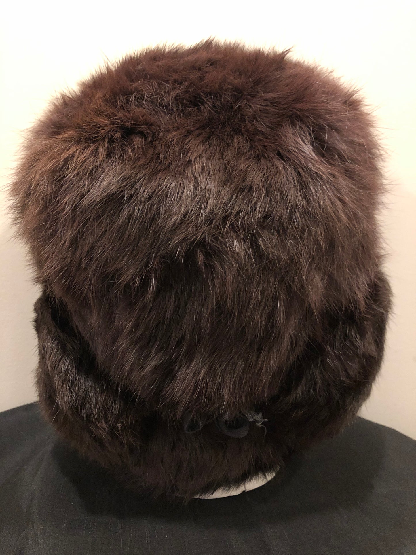 Kingspier Vintage - Vintage Russian ushanka dark brown fur hat. The tag reads XXL but it fits small.
This hat is in excellent condition.