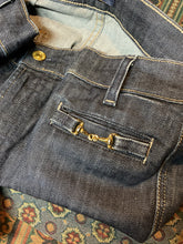 Load image into Gallery viewer, Kingspier Vintage -7 For All Mankind Denim Jeans - 30”x31”

Style P257080U-080U

Low rise

Slim cut

Dark wash

Brass buttons and details

98% Cotton/ 2% Lycra

Made in USA

