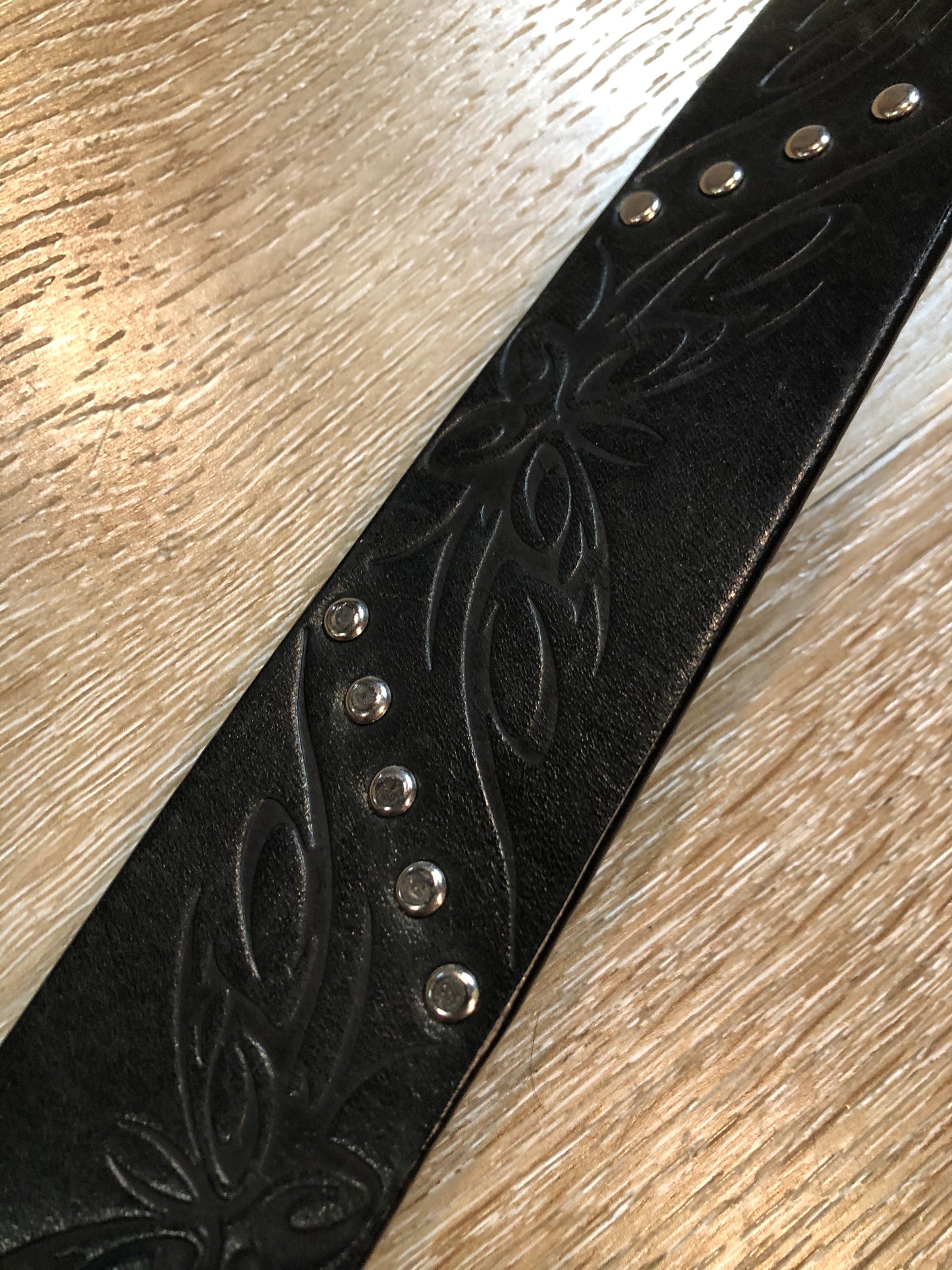 Kingspier Vintage - Black leather belt with butterfly motif tooling and buckle with faux turquoise stone.