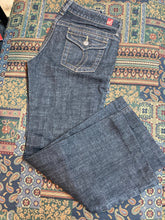 Load image into Gallery viewer, Kingspier Vintage - Dish Deadstock Denim Wide Leg Jeans - 30”x25.5”

Size 27

Low rise

Wide leg

Back flap pockets

Dark wash

98% Cotton/ 2% Spandex

Made in Hong Kong
