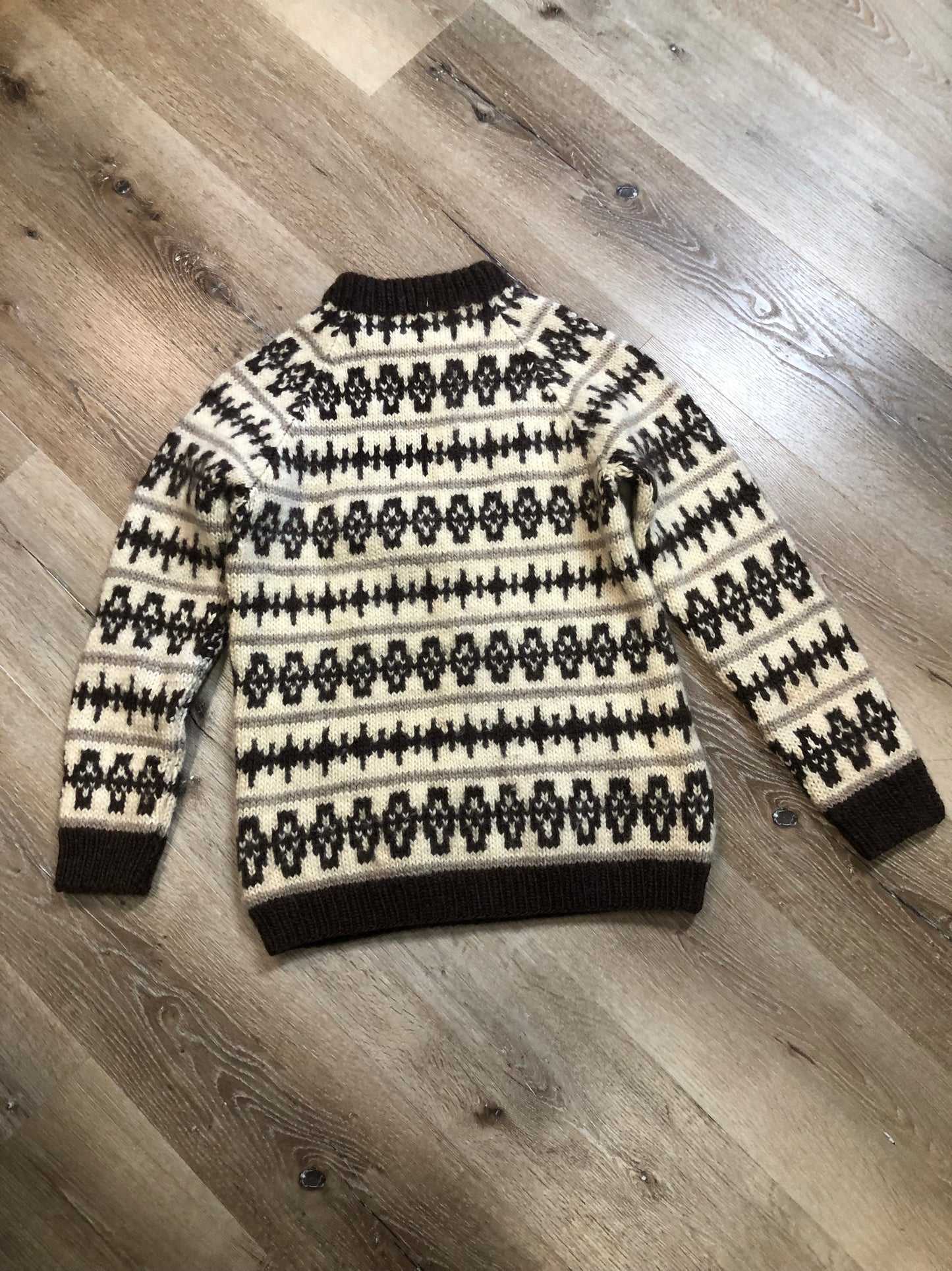 Kingspier Vintage - Vintage Joanne Knitwear 100% wool crewneck sweater with brown and beige fair isle design.
Made in Ayrshire, Scotland.