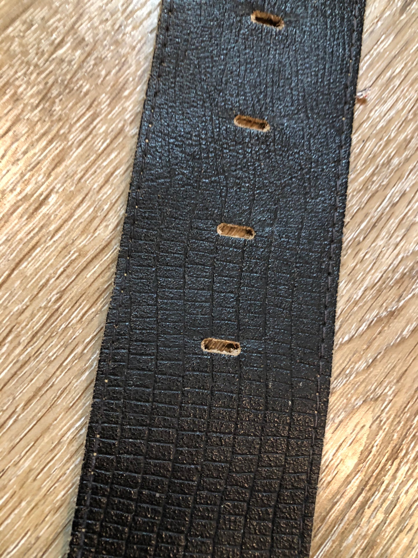 Kingspier Vintage - Black croc-embossed leather belt with brass buckle.