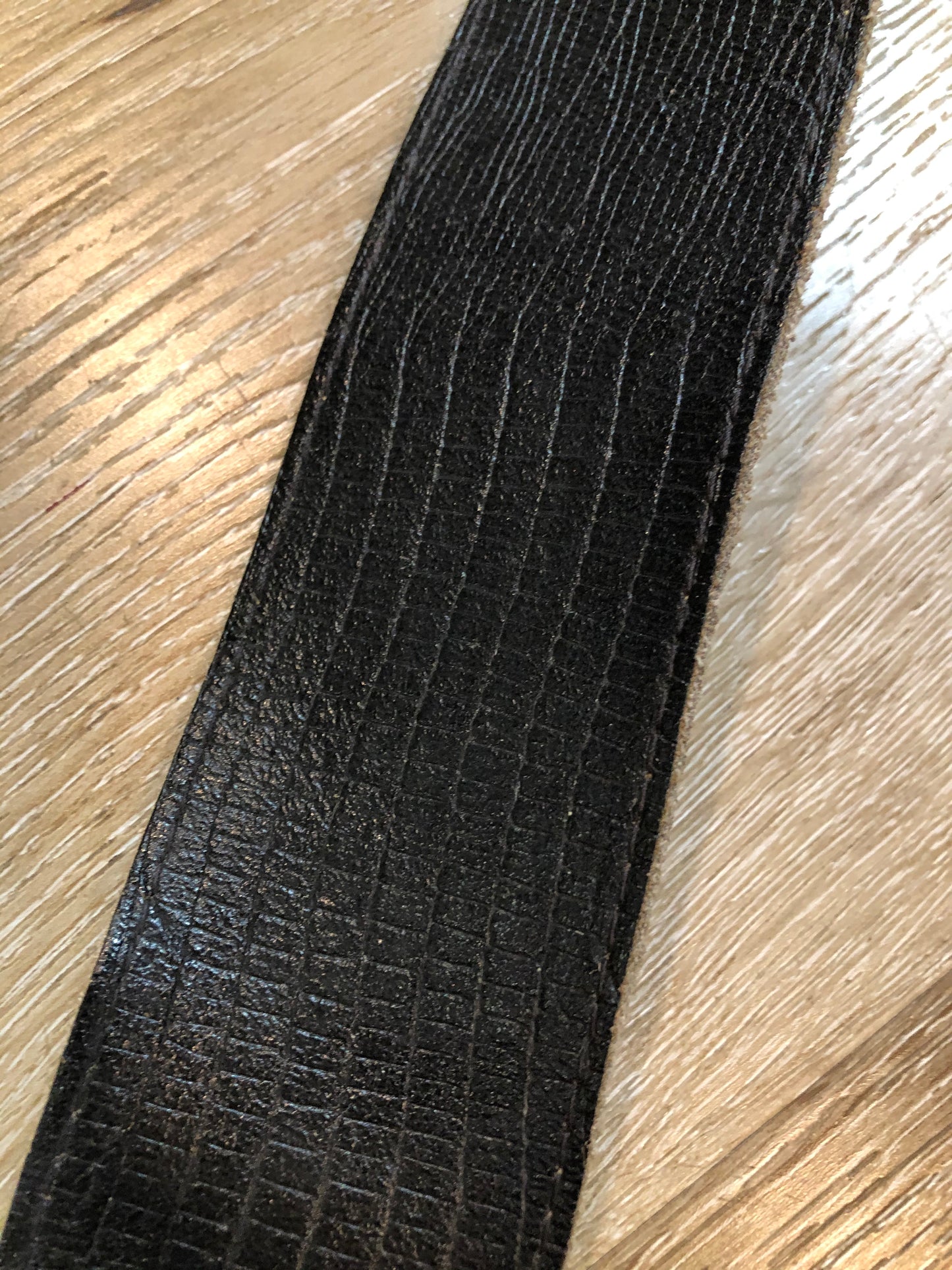 Kingspier Vintage - Black croc-embossed leather belt with brass buckle.