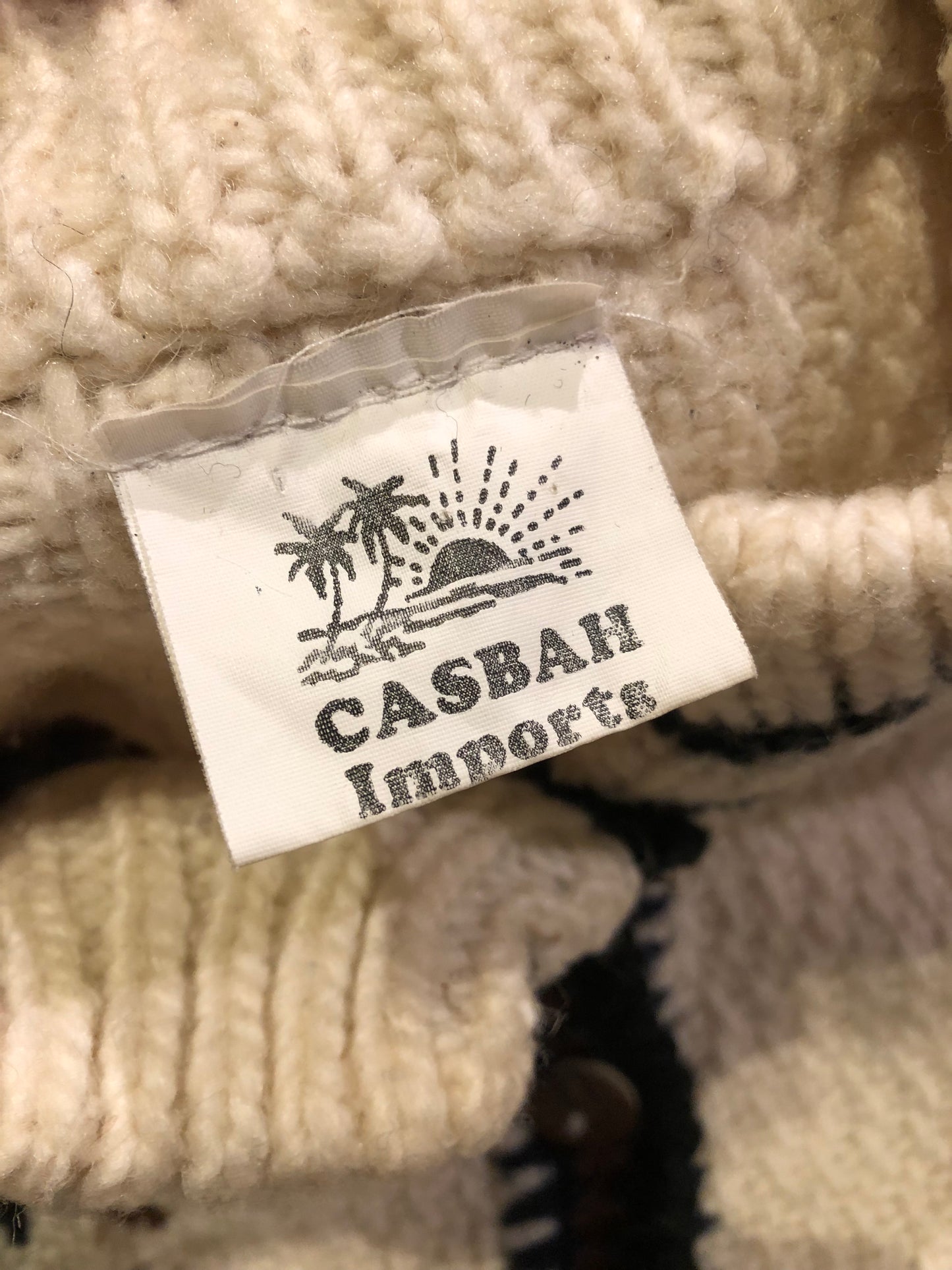 Kingspier Vintage - Vintage Casbah Imports 100% wool cardigan with coconut shell buttons.
Made in Ecuador.