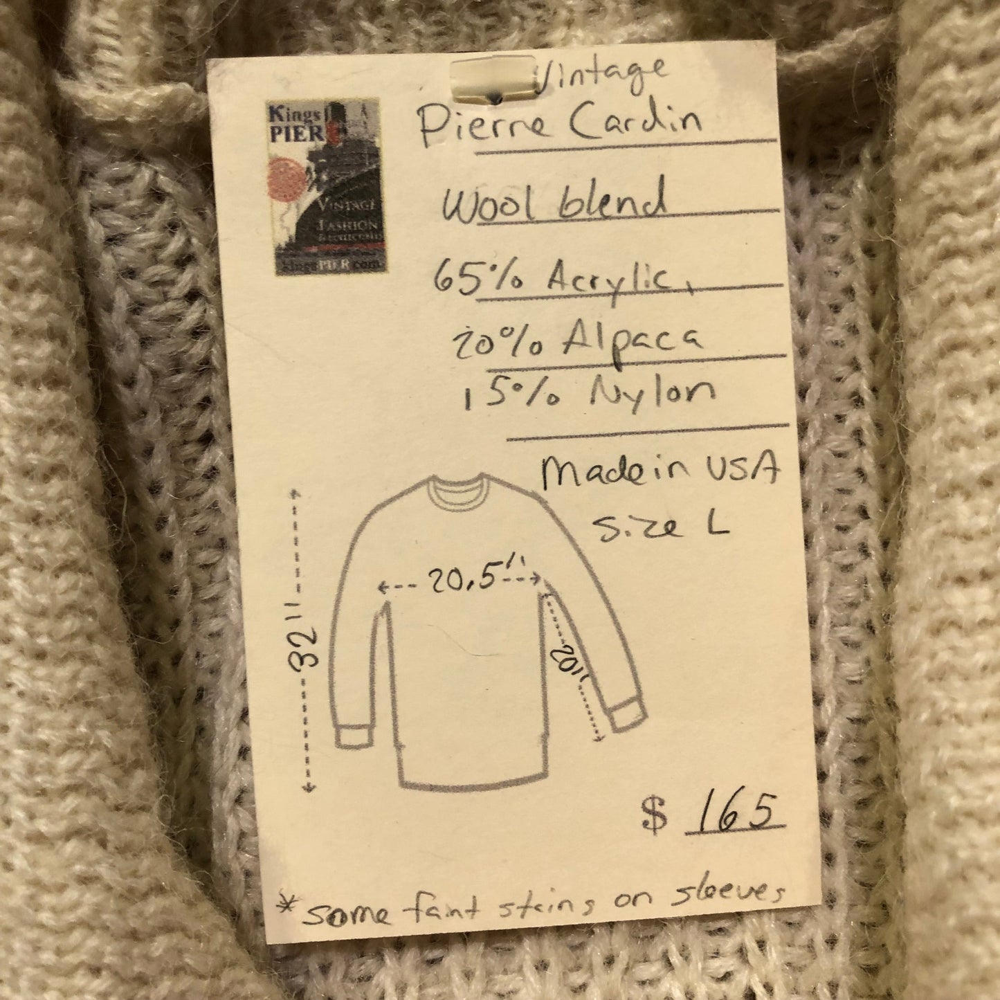 Kingspier Vintage - Vintage Pierre Cardin wool blend long cardigan with button closures and two front pockets.
/65% Acrylic, 20% Alpaca, 15% Nylon.
Made in USA.
Size large.