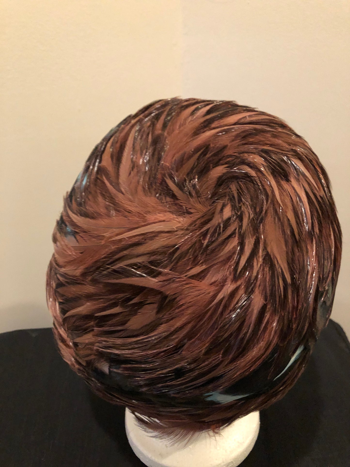 Kingspier Vintage - Vintage brown felt hat with black, brown, blue and pink feathers. No tags.
Circumference - 21”
Hat is in excellent vintage condition.