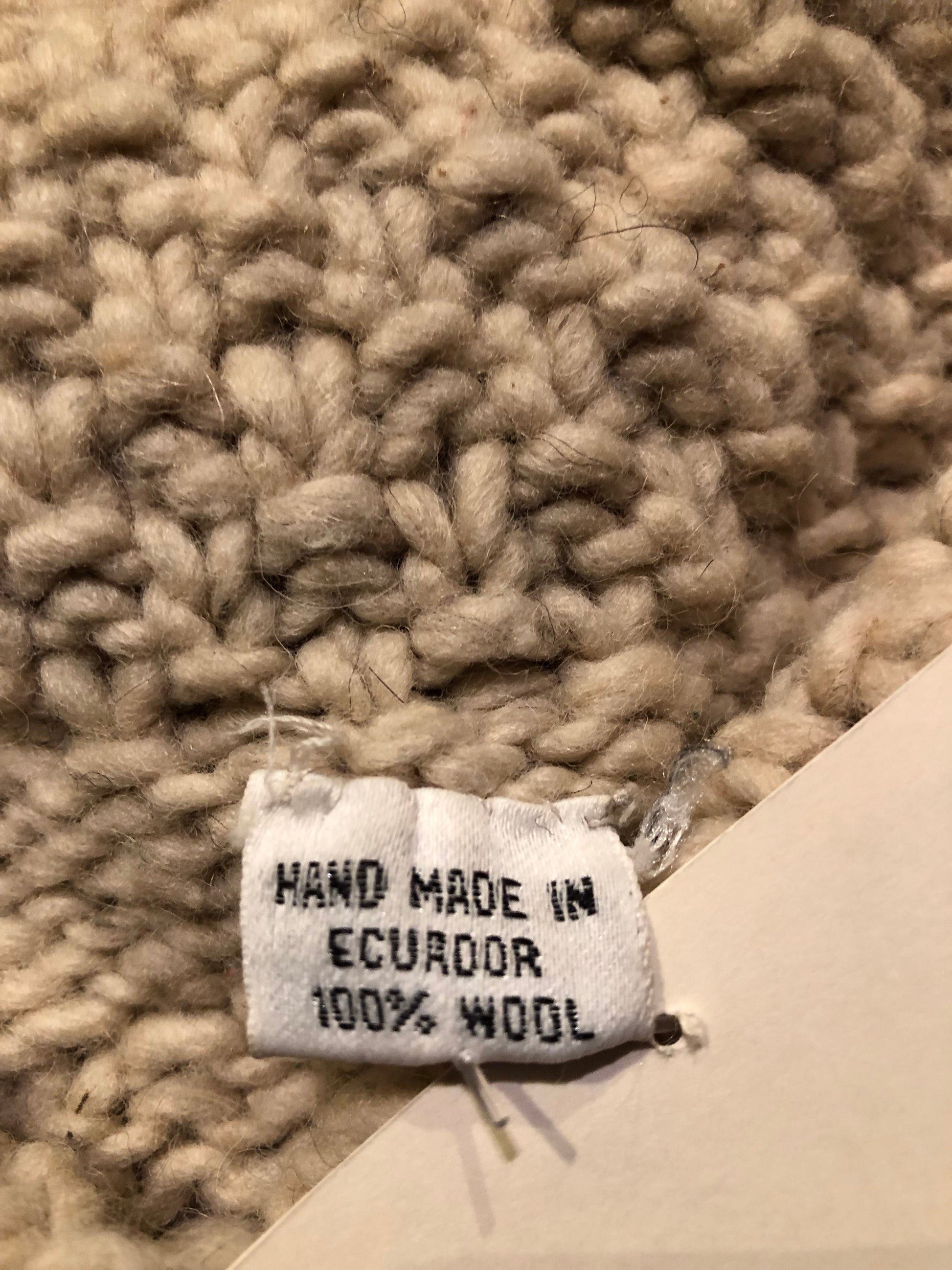 Kingspier Vintage - Vintage 100% wool quarter button pullover sweater featuring wooden buttons.
Made in Ecuador.
Size large.XL.