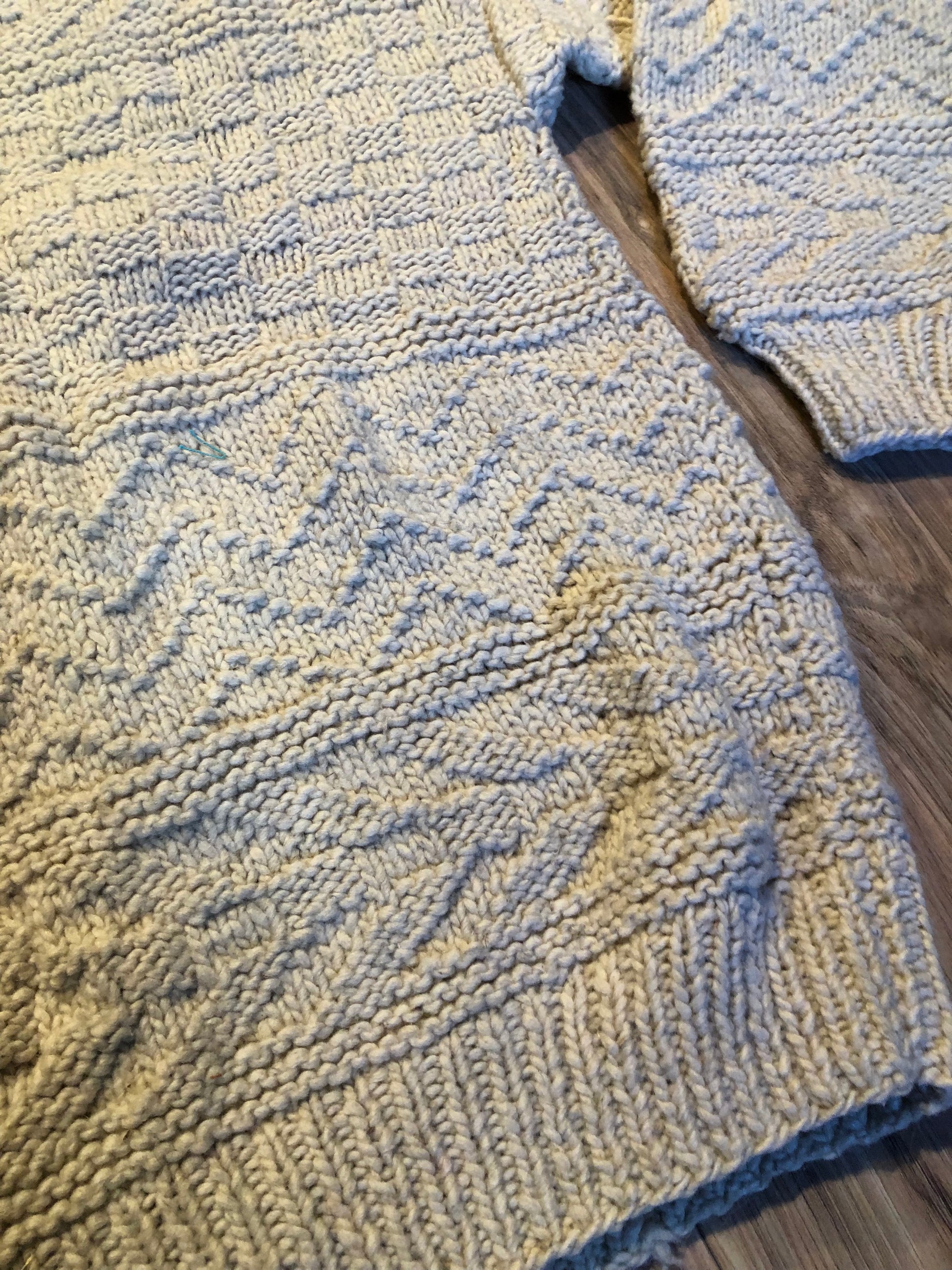 Kingspier Vintage - Vintage 100% wool quarter button pullover sweater featuring wooden buttons.
Made in Ecuador.
Size large.XL.