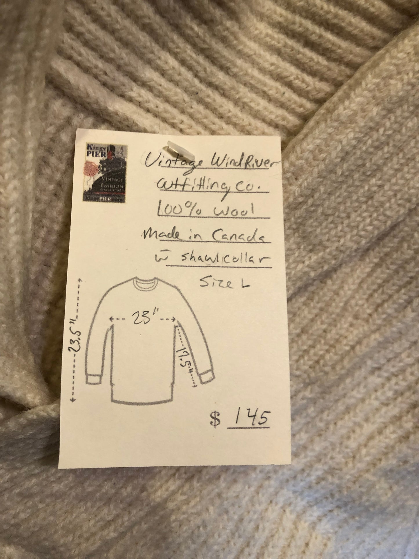 Kingspier Vintage - Vintage Wind River Outfitting Co.
Cream coloured 100% wool sweater with rib knit stitch and shawl collar.
Made in Canada.
Size large.