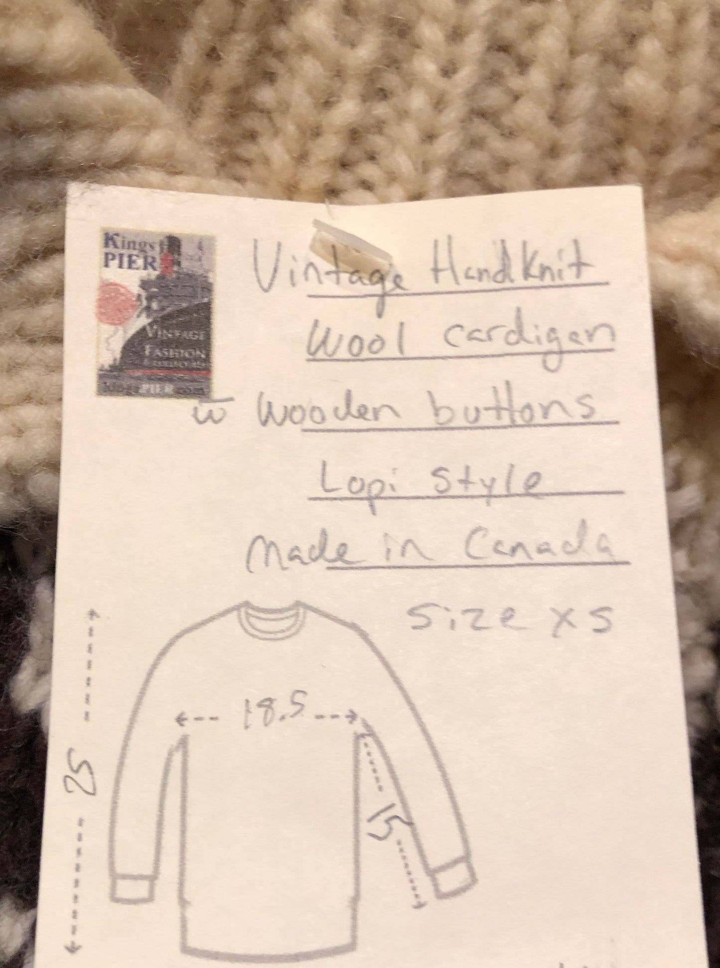 Kingspier Vintage - Vintage hand-knit wool Lopi style cardigan with wooden buttons.
Made in Canada.
Size XS.