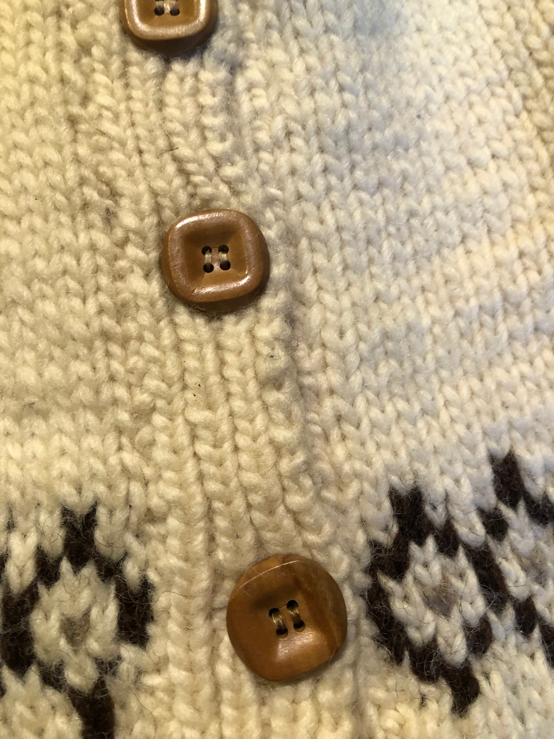 Kingspier Vintage - Vintage hand-knit wool Lopi style cardigan with wooden buttons.
Made in Canada.
Size XS.
