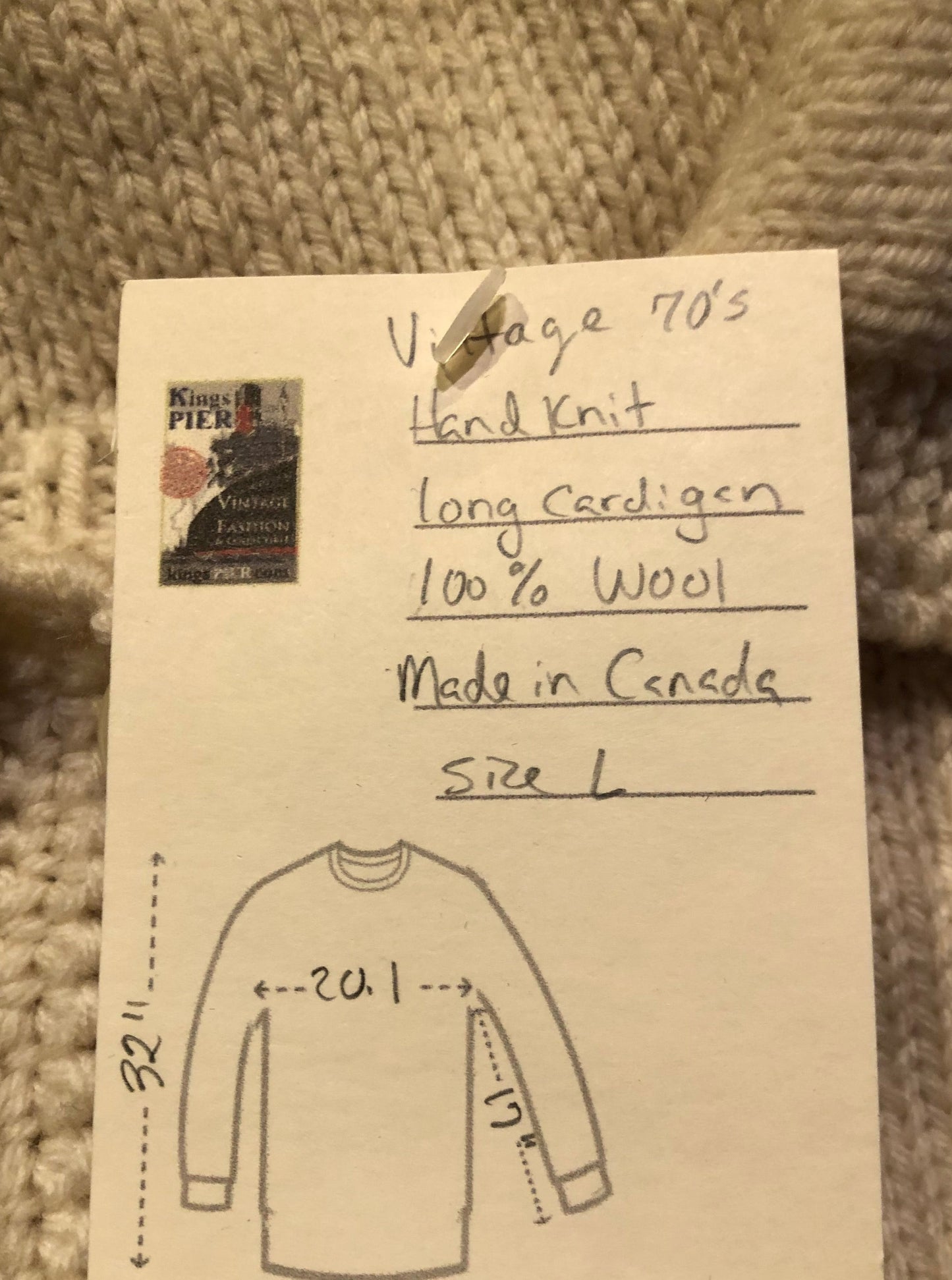 Kingspier Vintage - Vintage 70’s hand-knit 100% wool long cardigan with button closures and dark green stripes.
Made in Canada.
Size large.