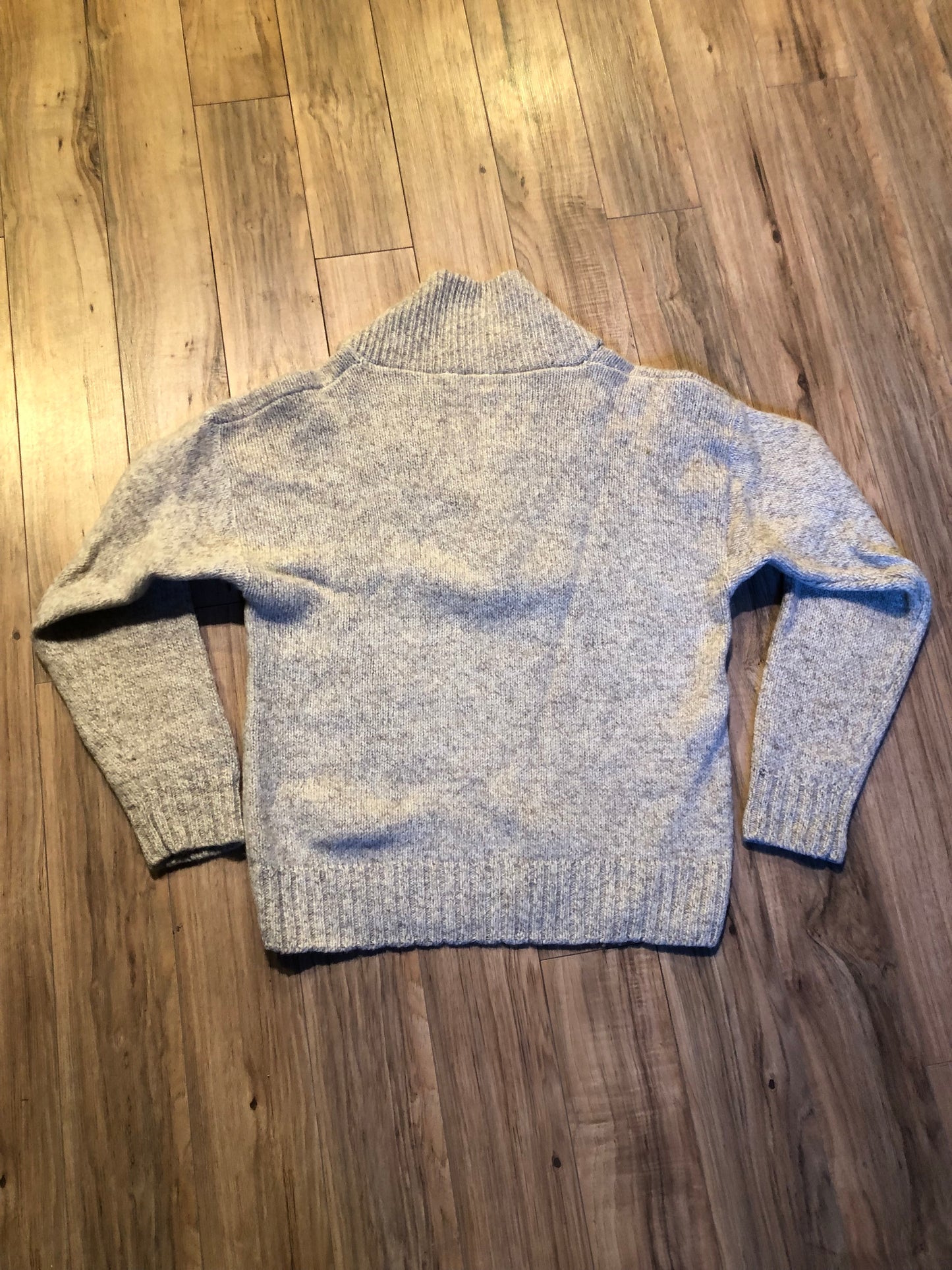 Kingspier Vintage - Vintage Cricketeer wool blend pullover sweater with shawl collar and one button.
Size large.