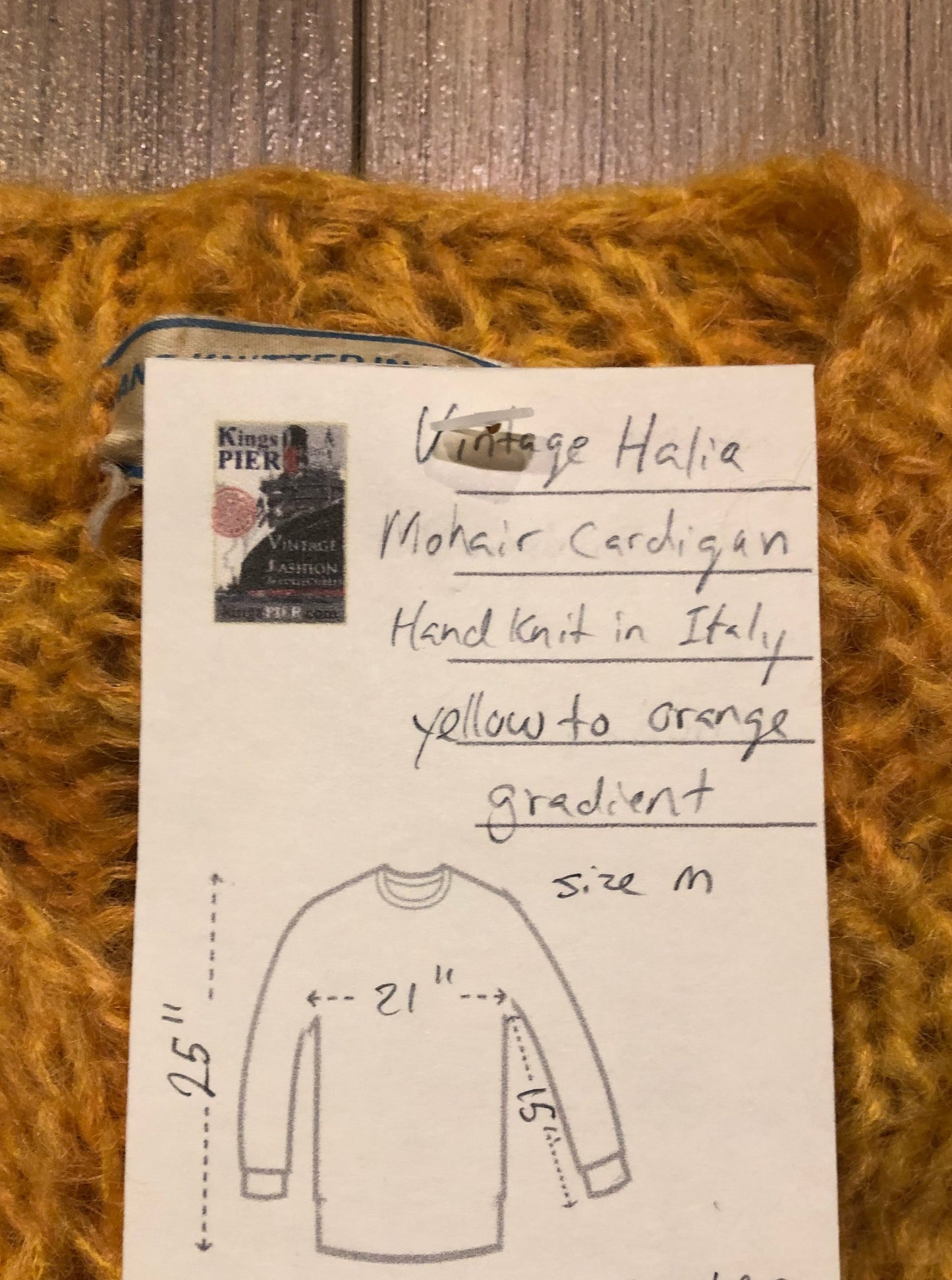 Kingspier Vintage - Vintage Halia mohair cardigan with button closures and yellow to orange gradient design.
Handknit in Italy.
Size medium.